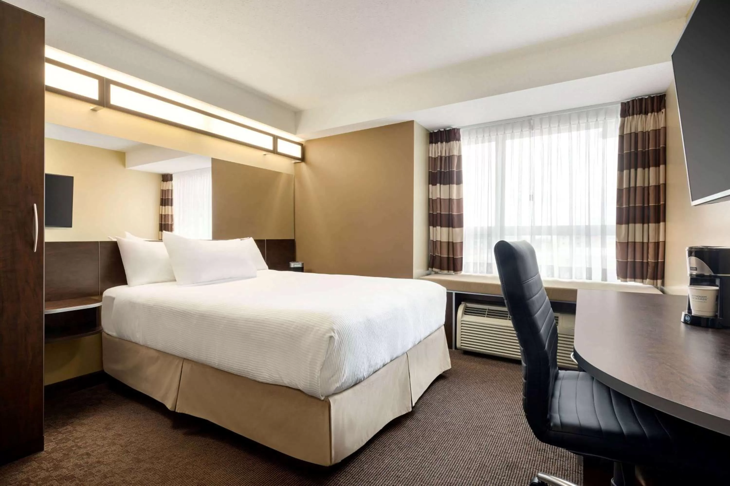 Photo of the whole room, Bed in Microtel Inn & Suites by Wyndham Estevan