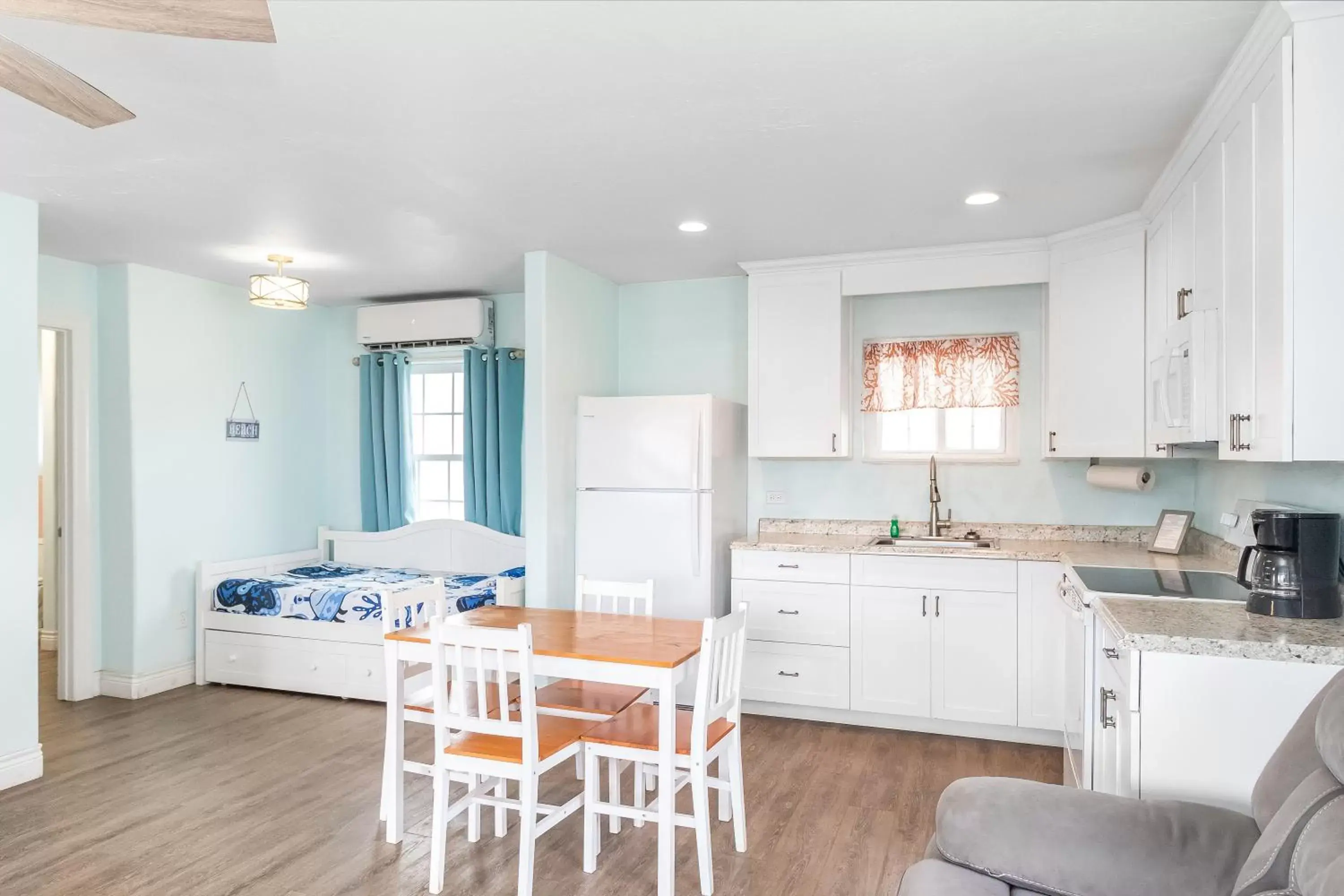 Bed, Kitchen/Kitchenette in Tropic Island Resort