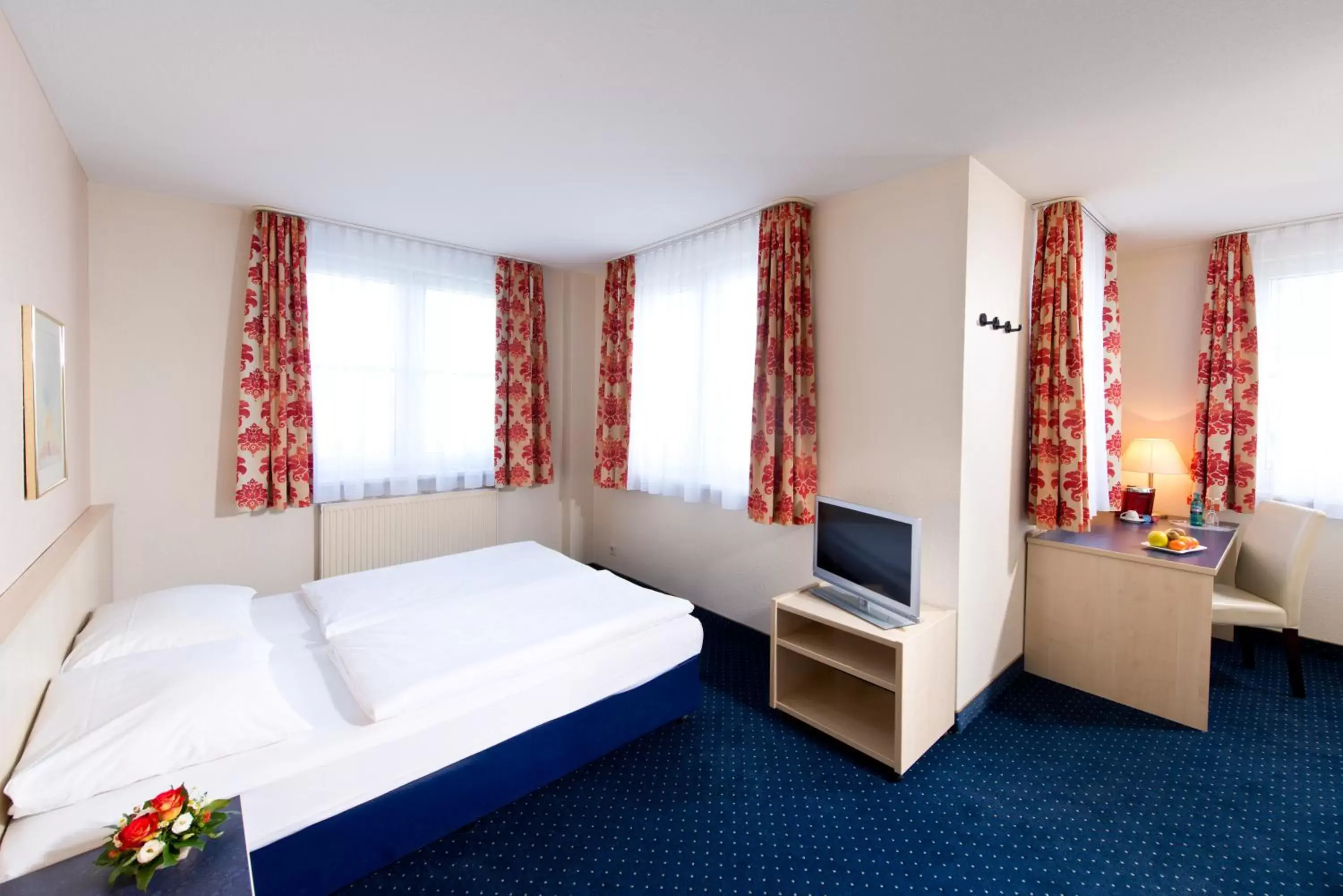 Photo of the whole room, Bed in ACHAT Hotel Leipzig Messe