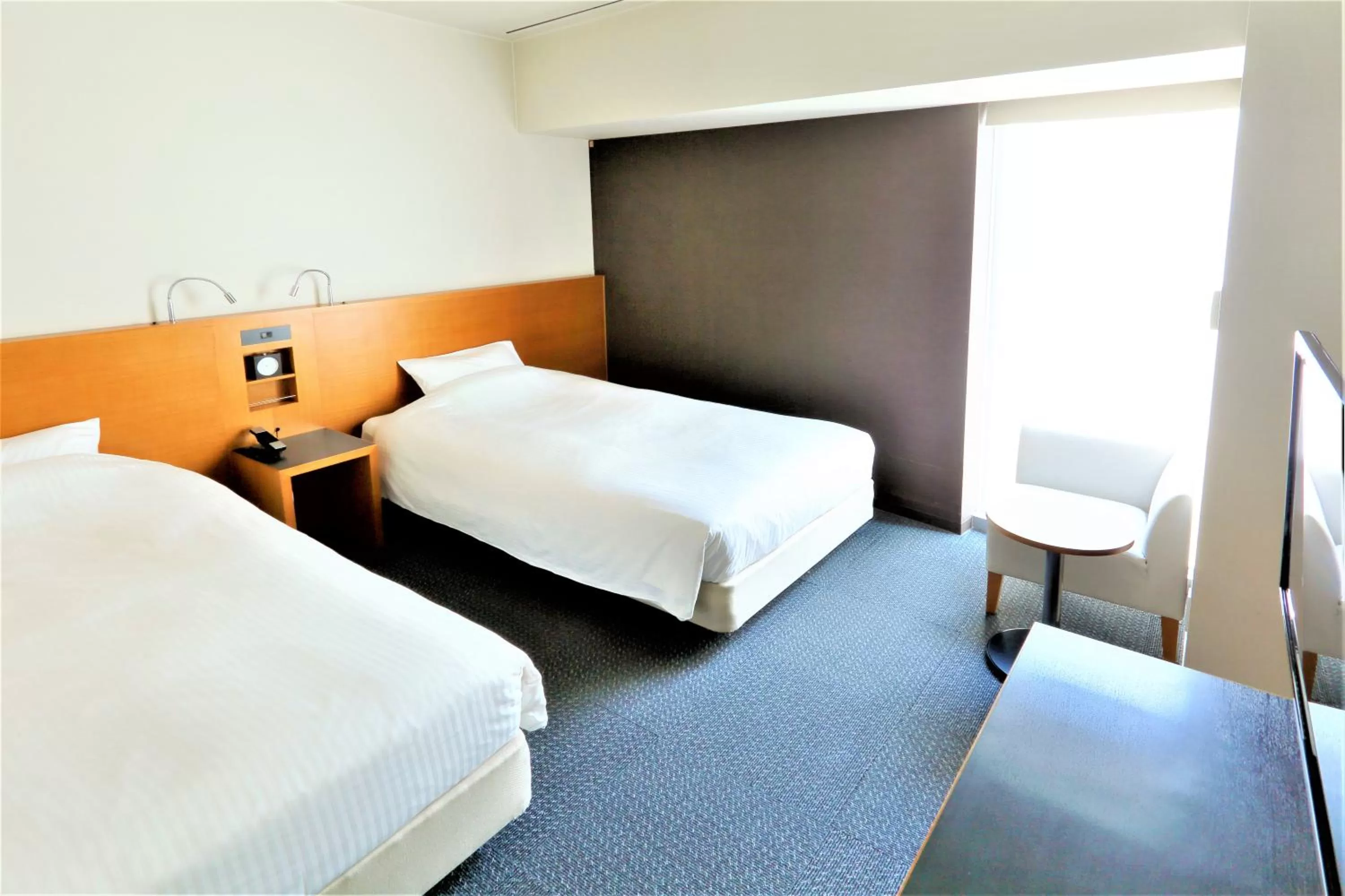 Photo of the whole room, Bed in JR Inn Sapporo