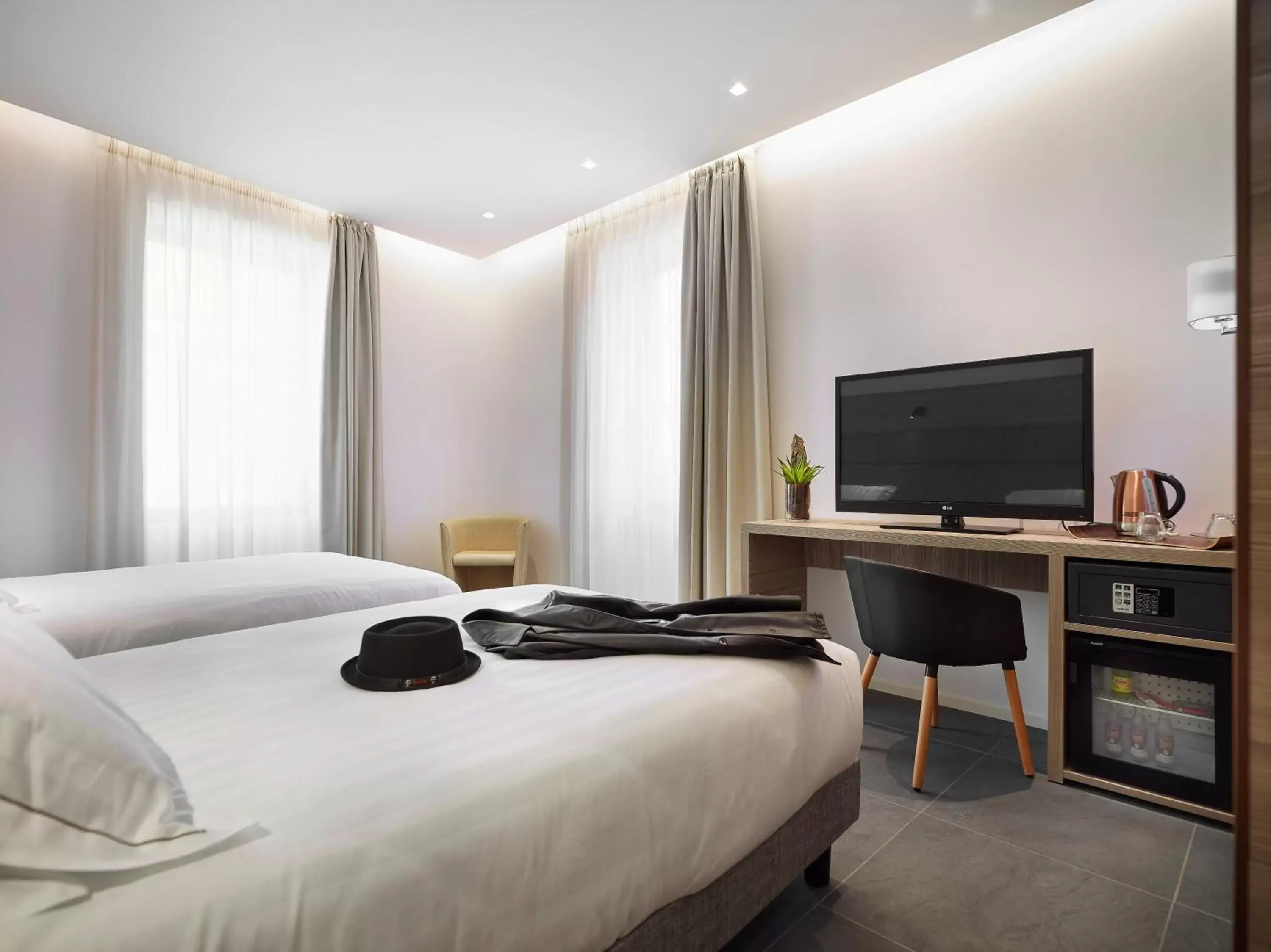 TV and multimedia, Bed in Boutique Hotel Touring TV and multimedia, Bed in Boutique Hotel Touring