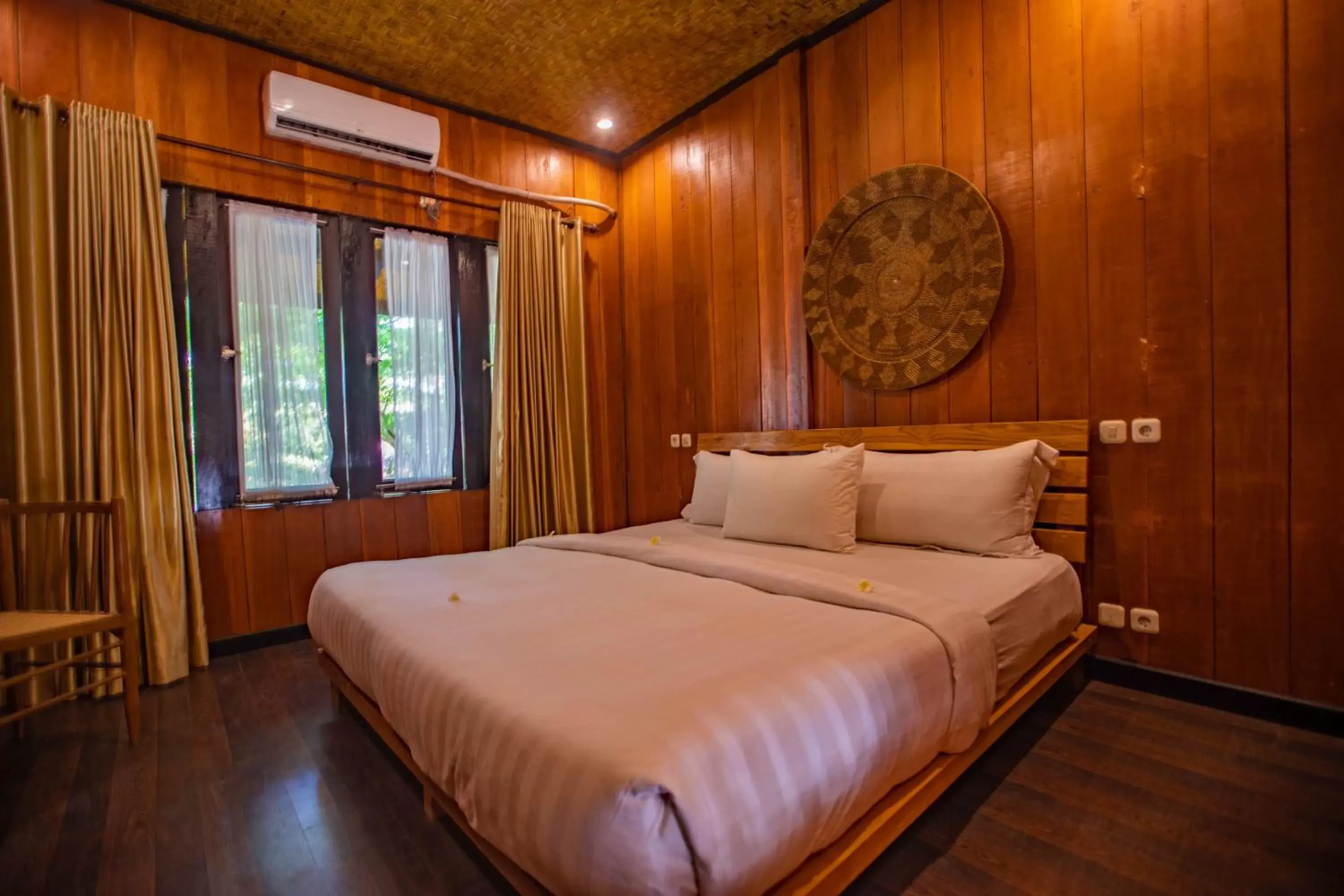 Bed in Gili Sands Hotel & Bar