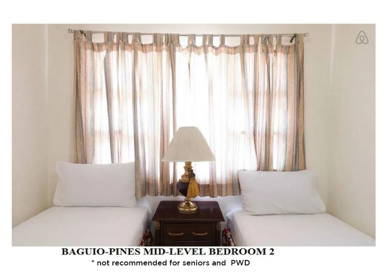 Bed in Agreeable Family Baguio Suites