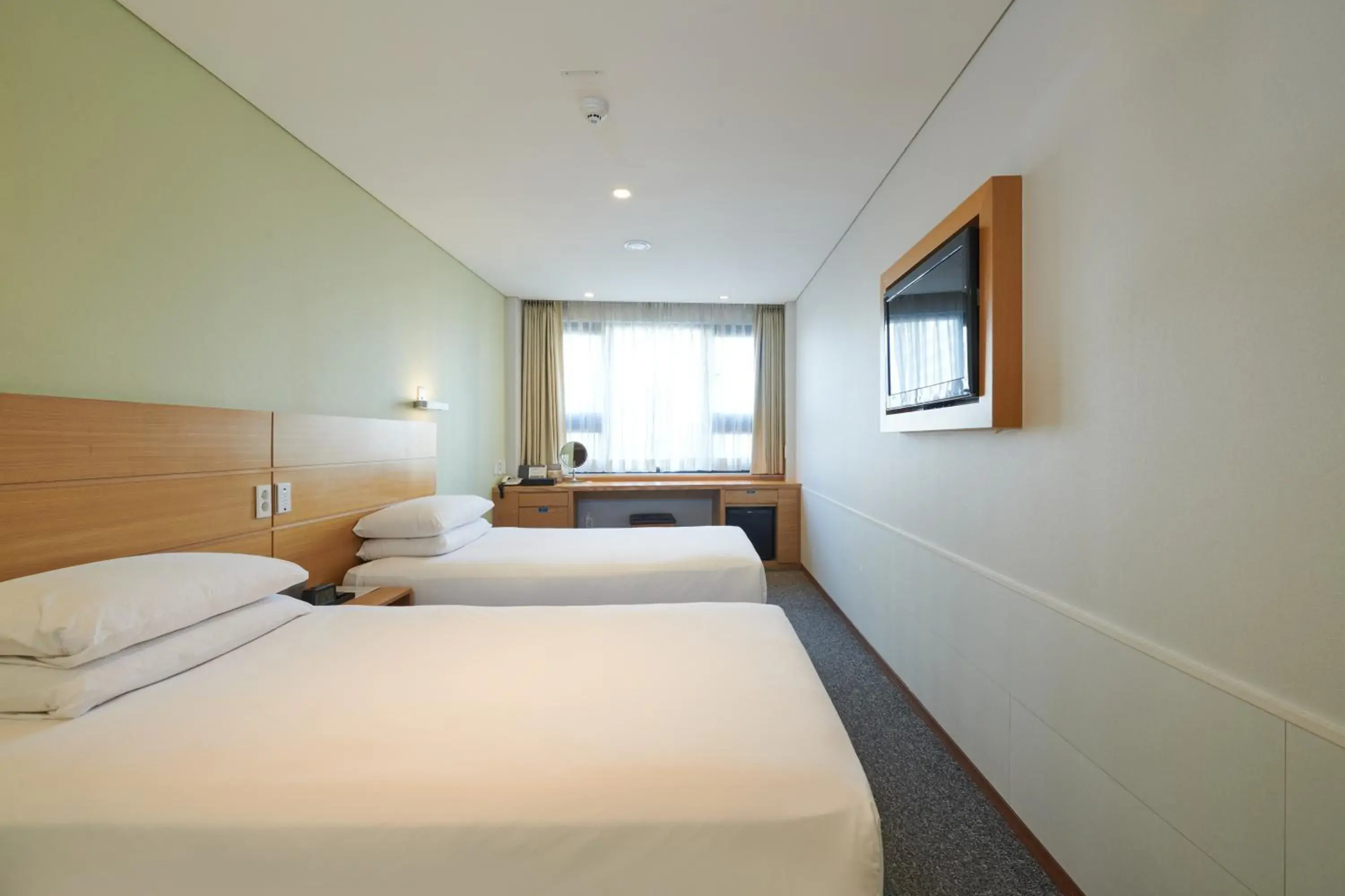 Bed in Nine Tree Hotel Myeongdong