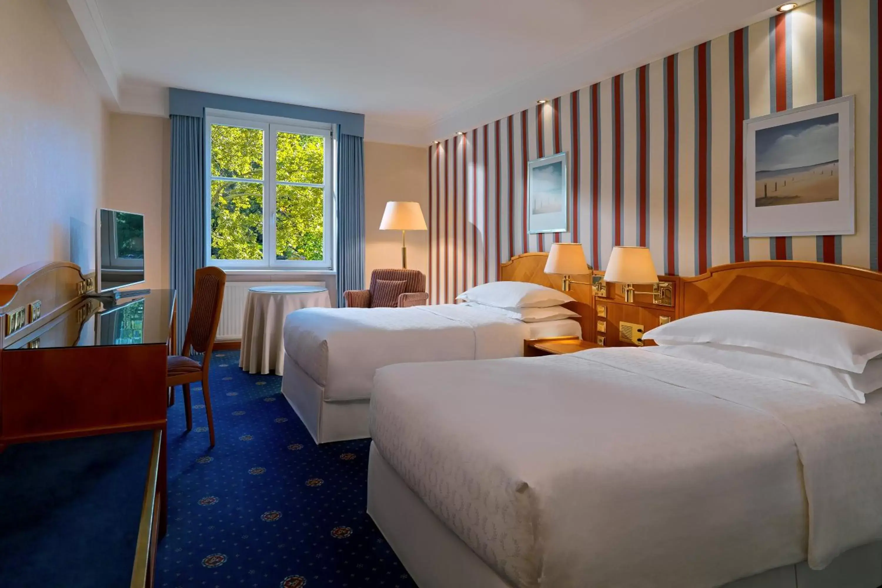 Photo of the whole room, Bed in Sheraton Grand Salzburg