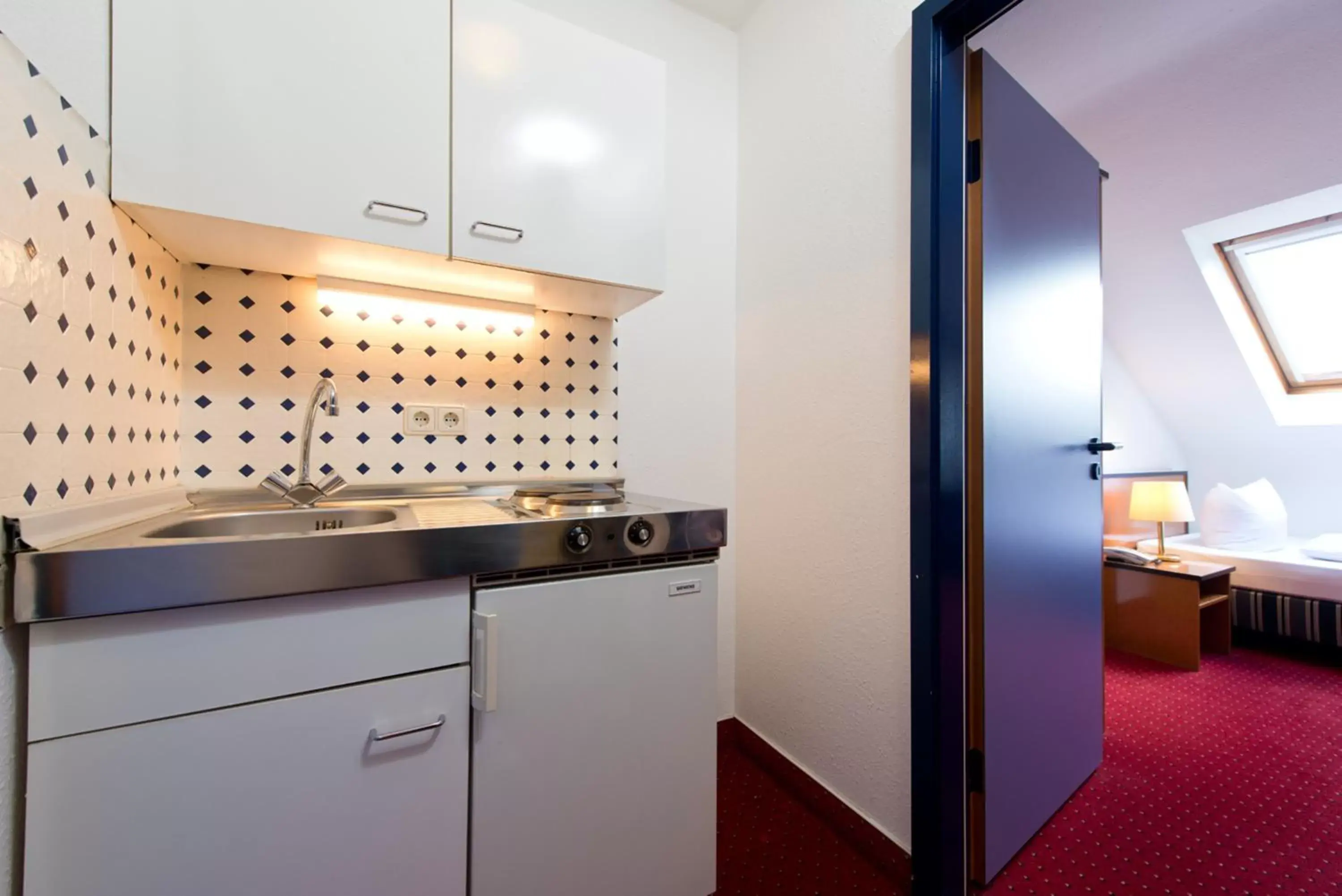 Kitchen or kitchenette, Kitchen/Kitchenette in ACHAT Hotel Frankenthal in der Pfalz