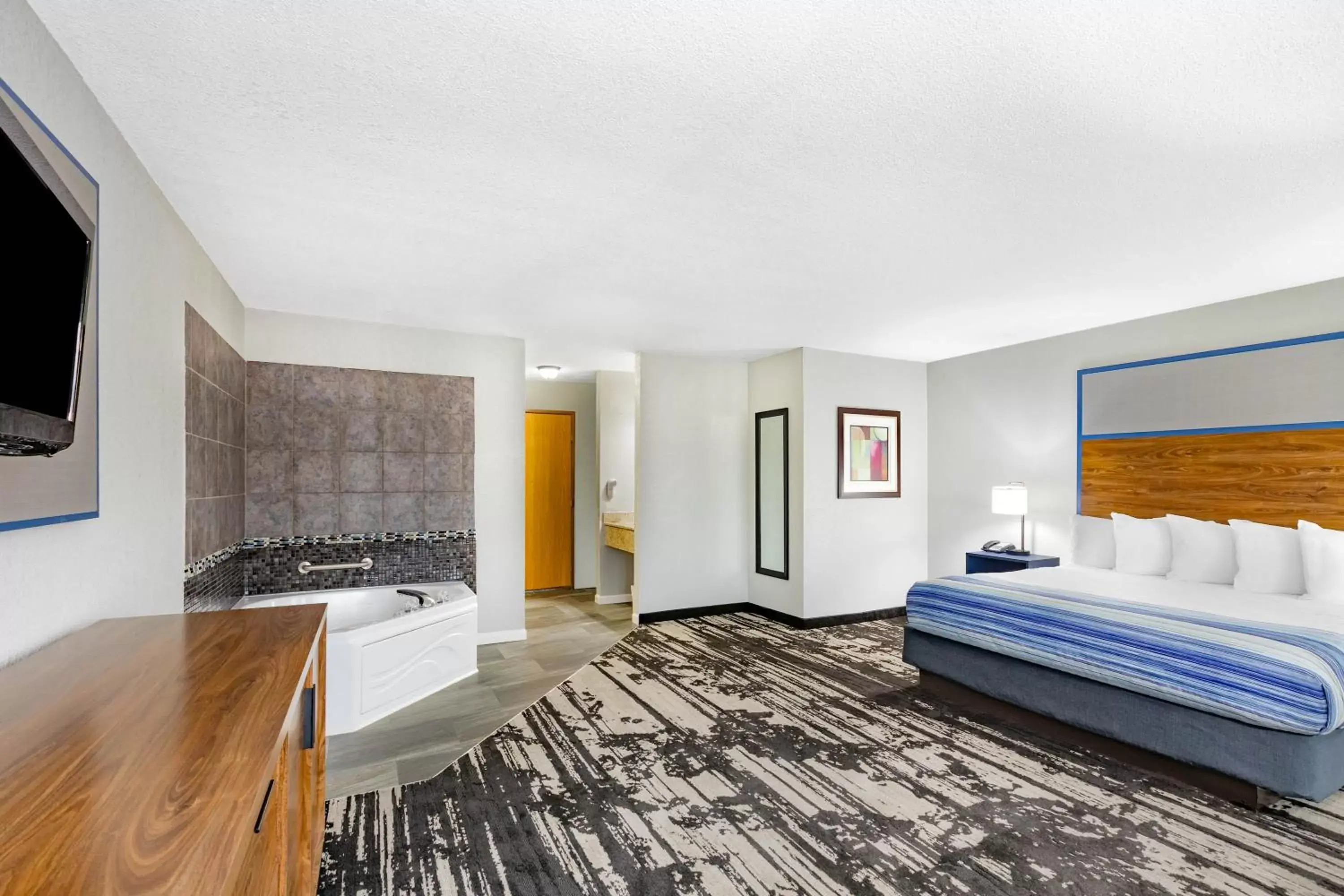 Photo of the whole room in AmericInn by Wyndham Pella