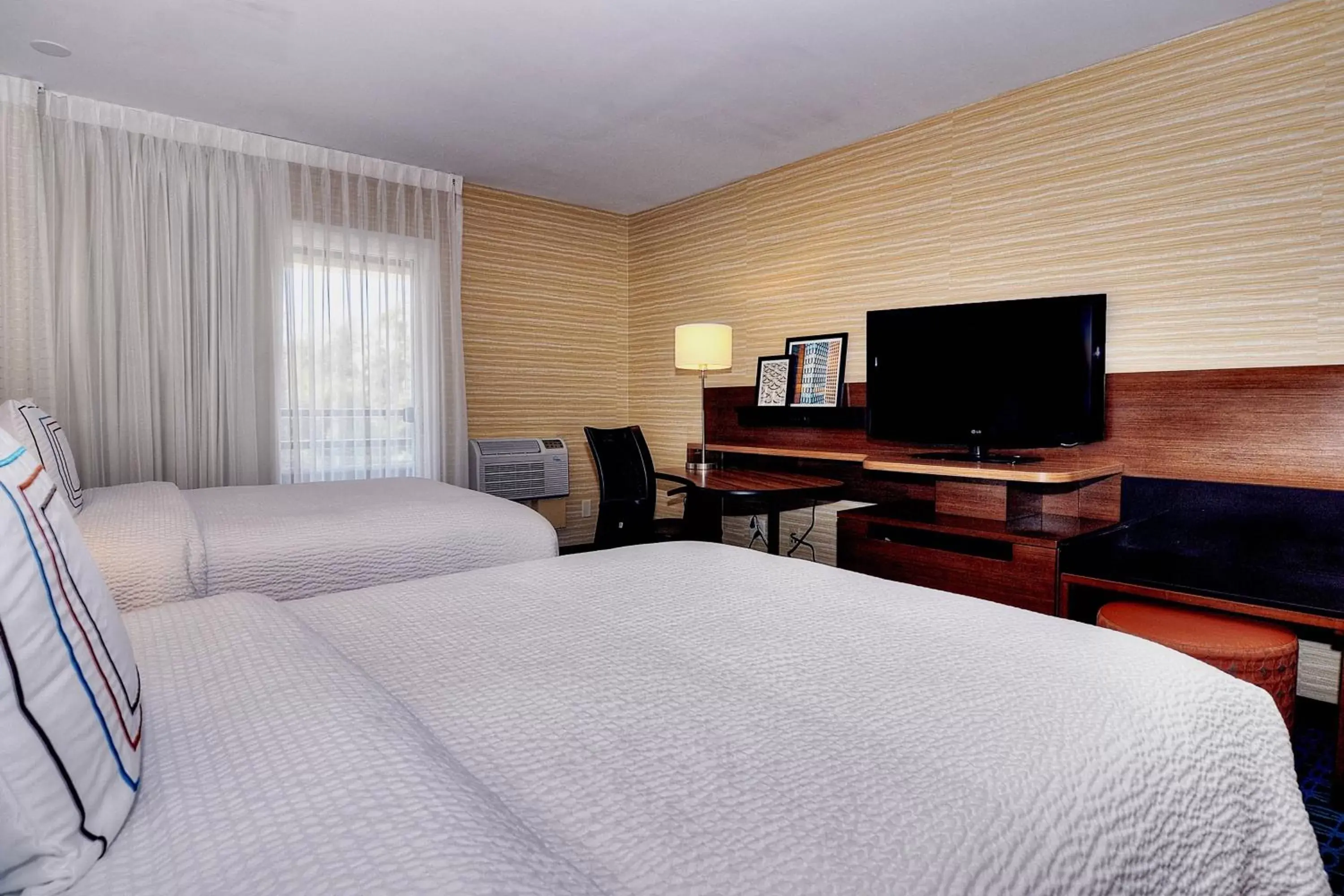 Photo of the whole room, TV/Entertainment Center in Fairfield Inn & Suites by Marriott Los Angeles Rosemead