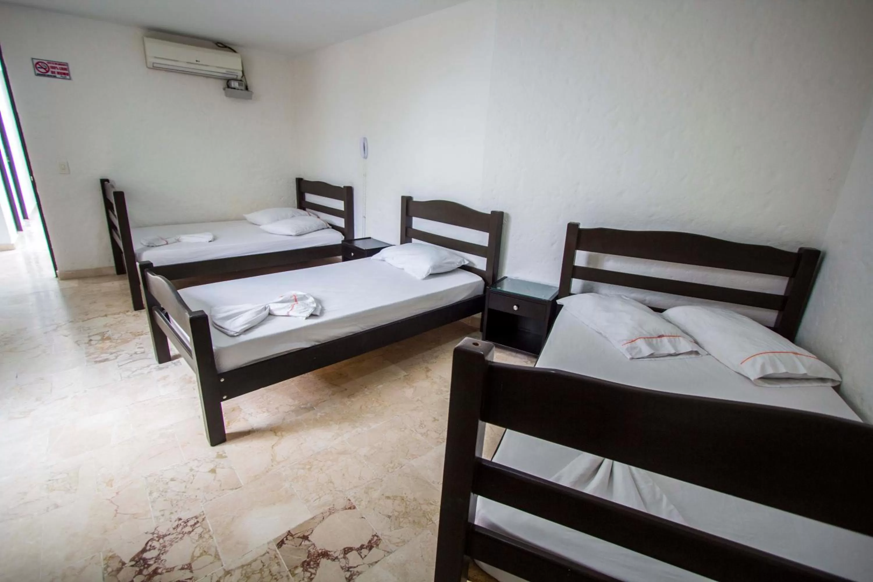 Bed in Blue Star Hotel