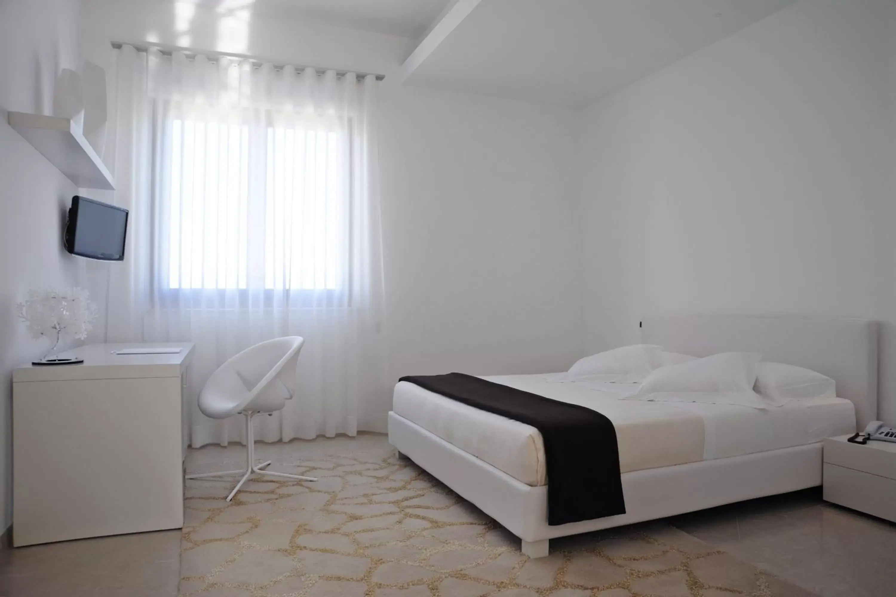 Bed, Room Photo in Pietre Nere Resort & Spa