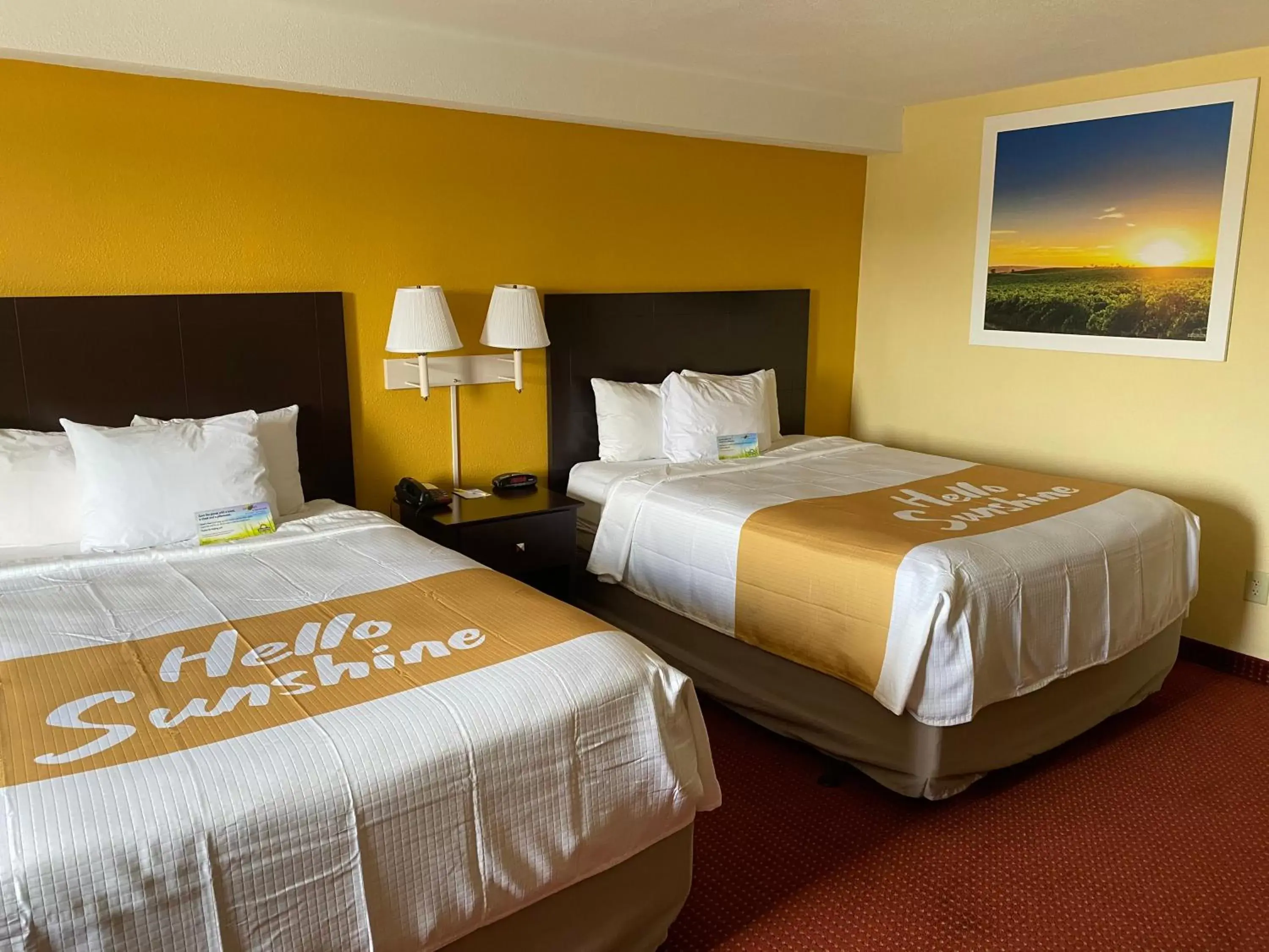Bed in Days Inn & Suites by Wyndham Des Moines Airport