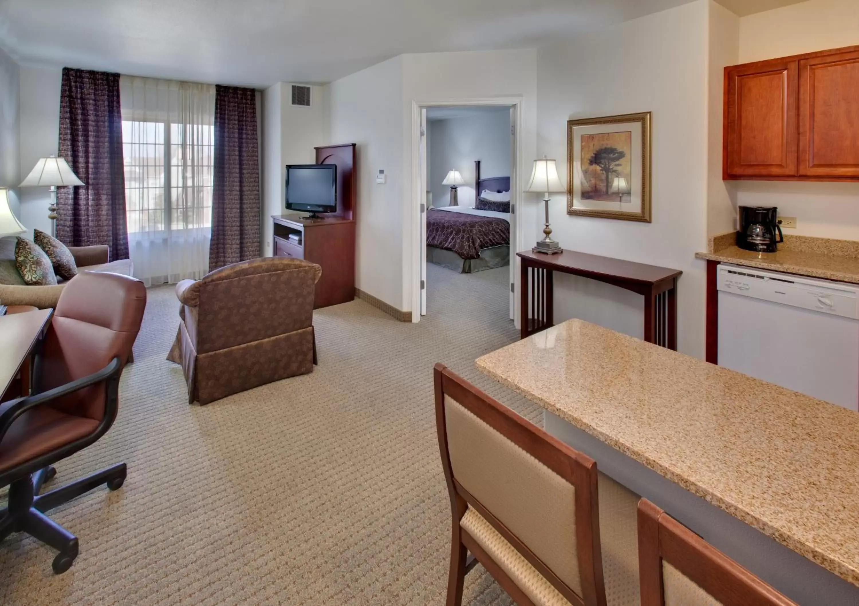 Property building, Seating Area in Staybridge Suites Rockford, an IHG Hotel