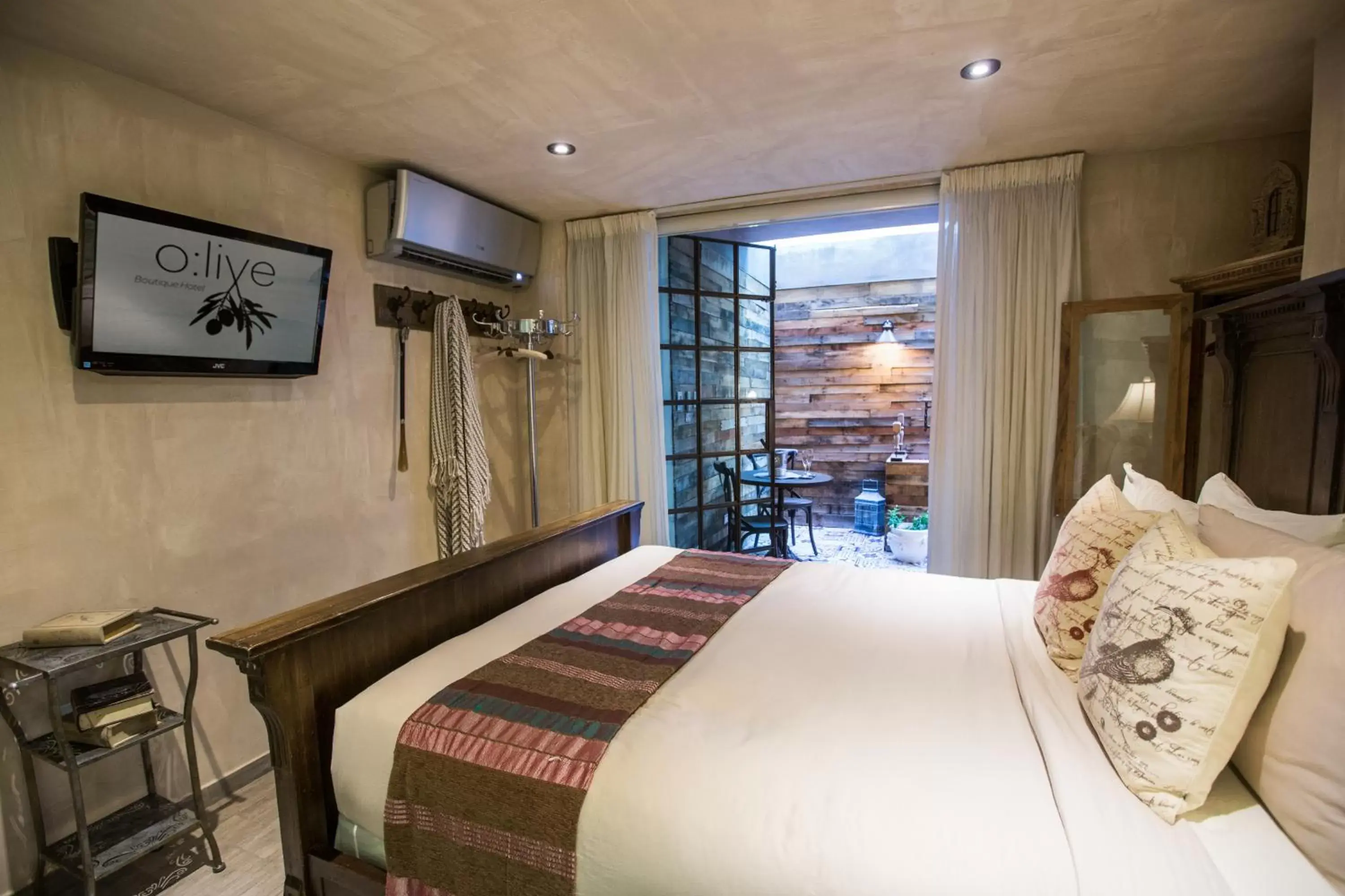 Photo of the whole room, Bed in O:Live Boutique Hotel, A Small Luxury Hotel of the World