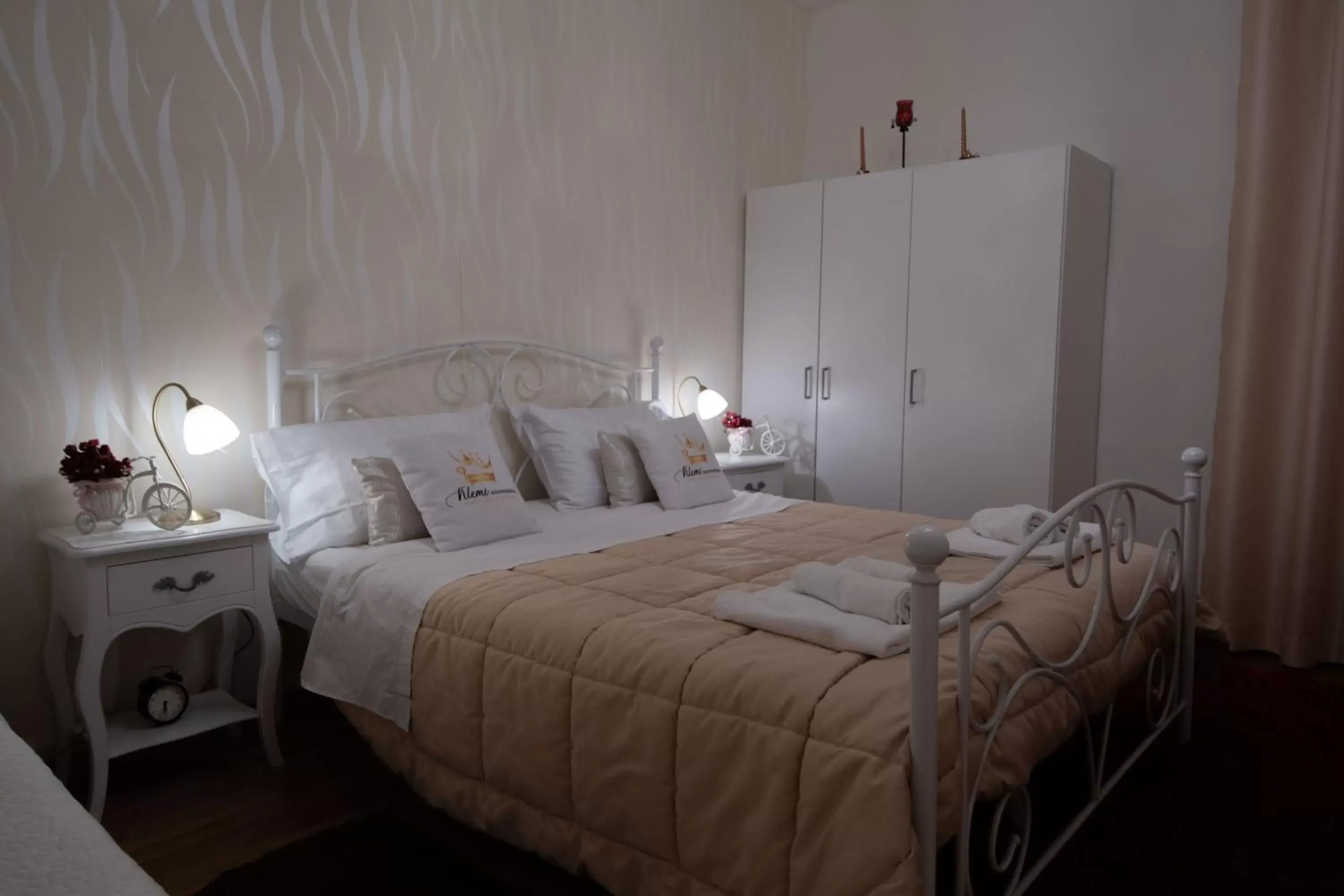 Bed in Casa Rosmini rooms