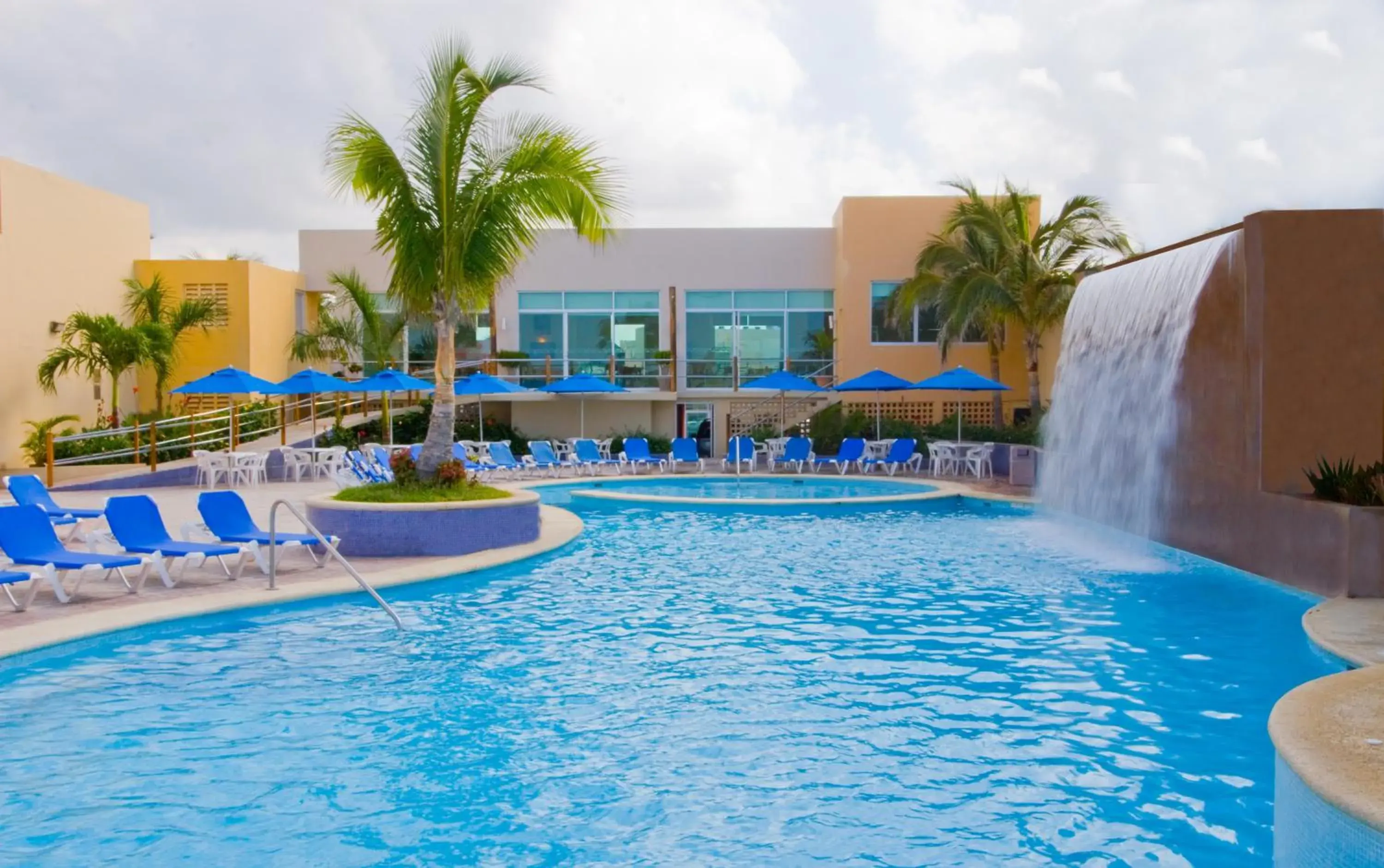 Property building in Las Flores Beach Resort Property building in Las Flores Beach Resort
