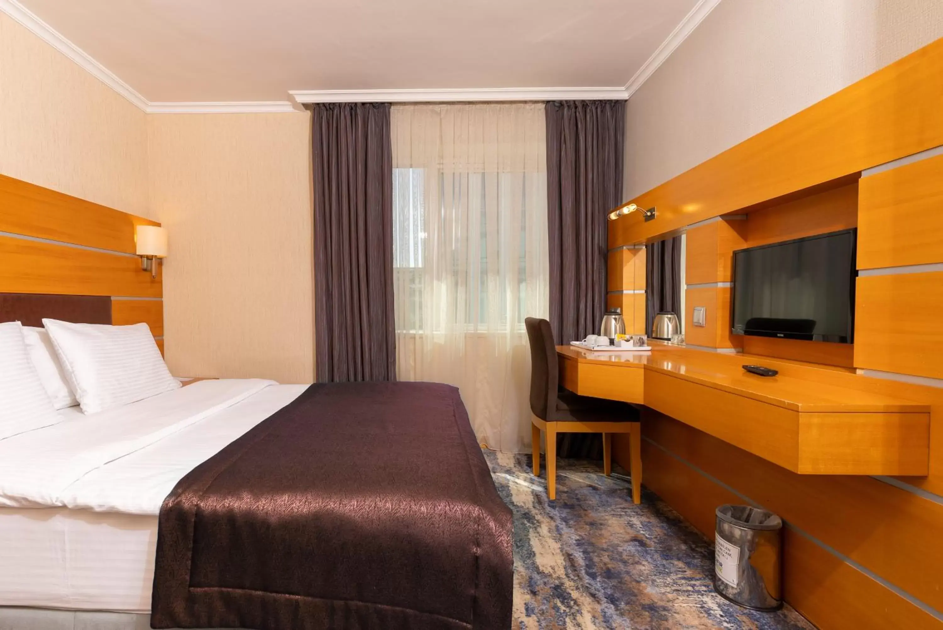 Bed in Ankara Plaza Hotel