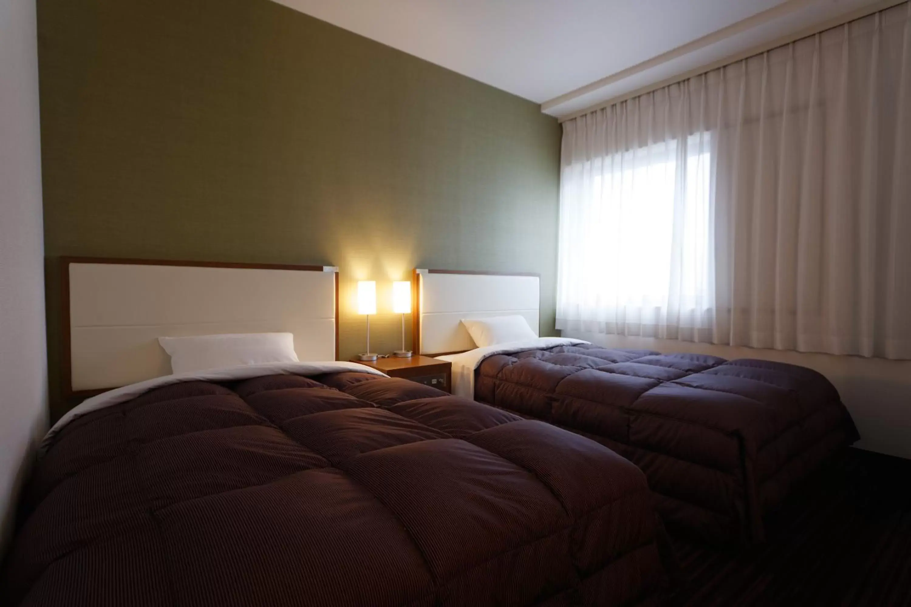 Photo of the whole room, Bed in Kagoshima Washington Hotel Plaza