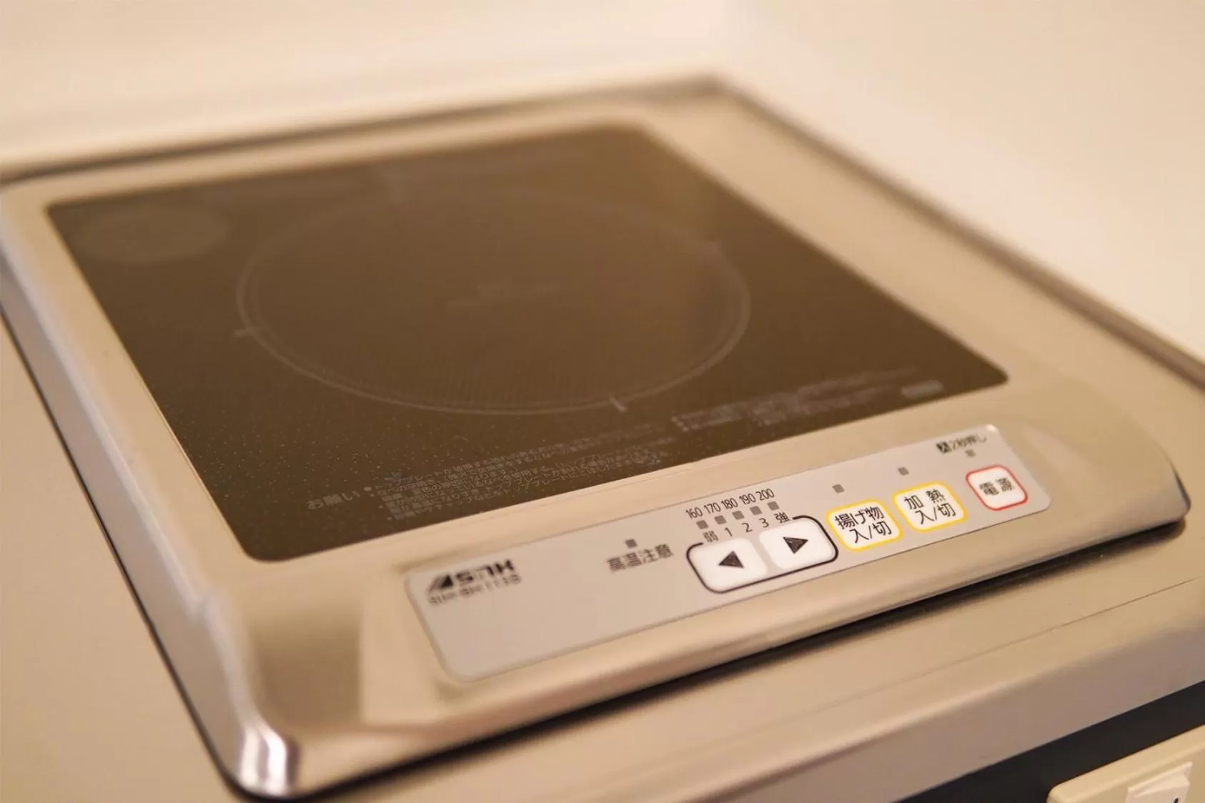 Kitchen or kitchenette in TAKETO STAY PREMIERE SAPPORO Eki