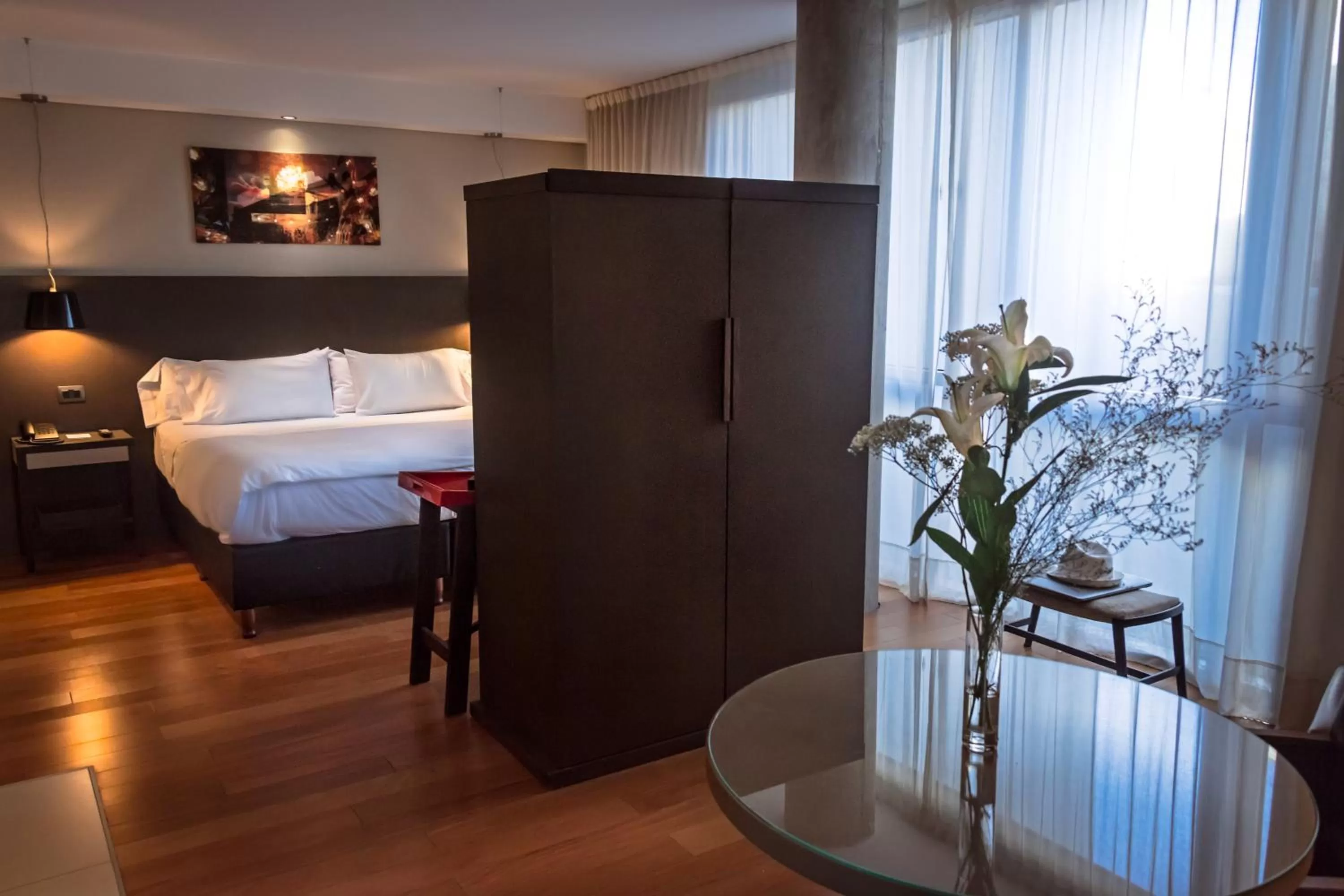 Living room, Bed in AXSUR Design Hotel