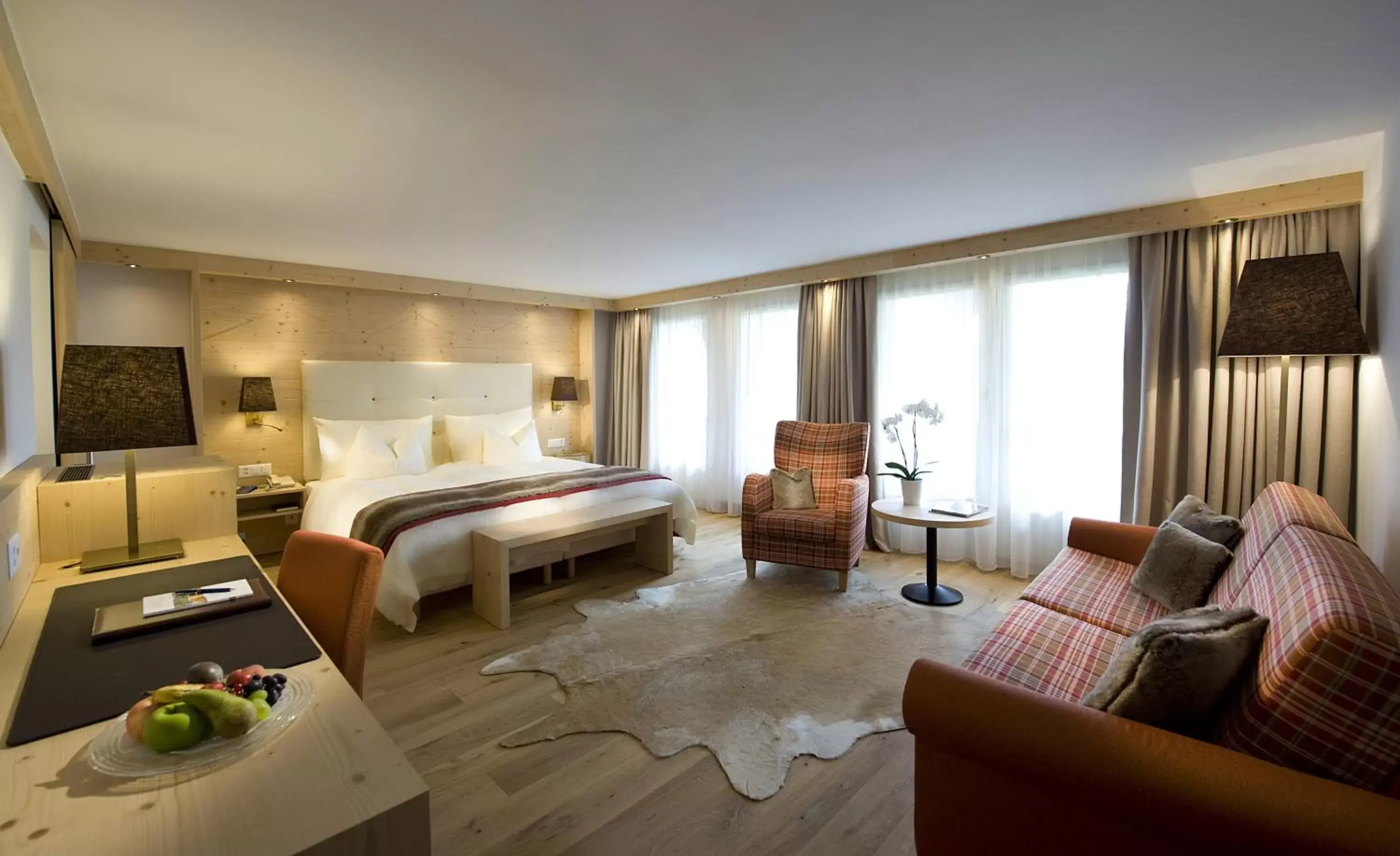 Bedroom in GOLFHOTEL Les Hauts de Gstaad & SPA