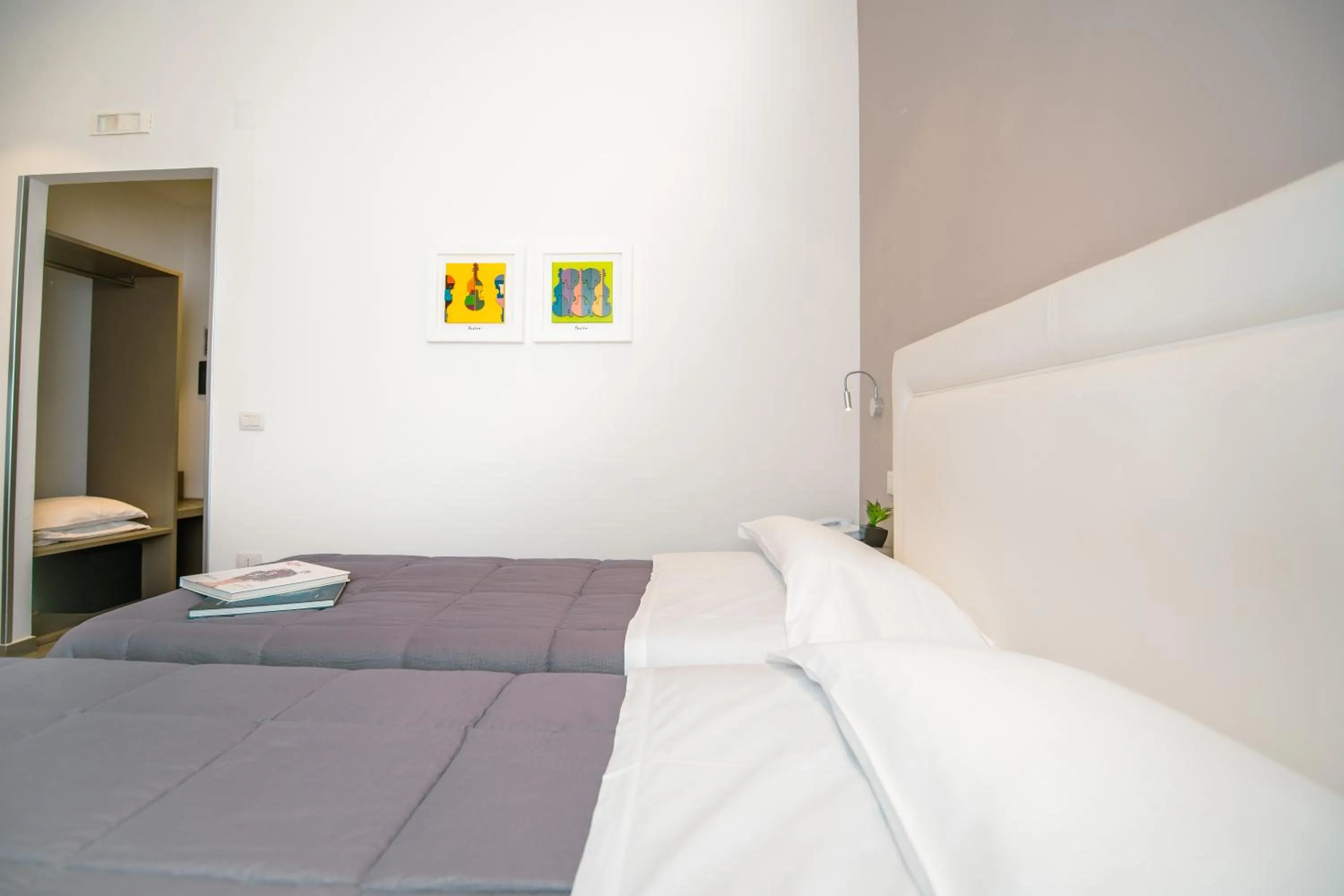 Bed in Hotel Bruman Salerno