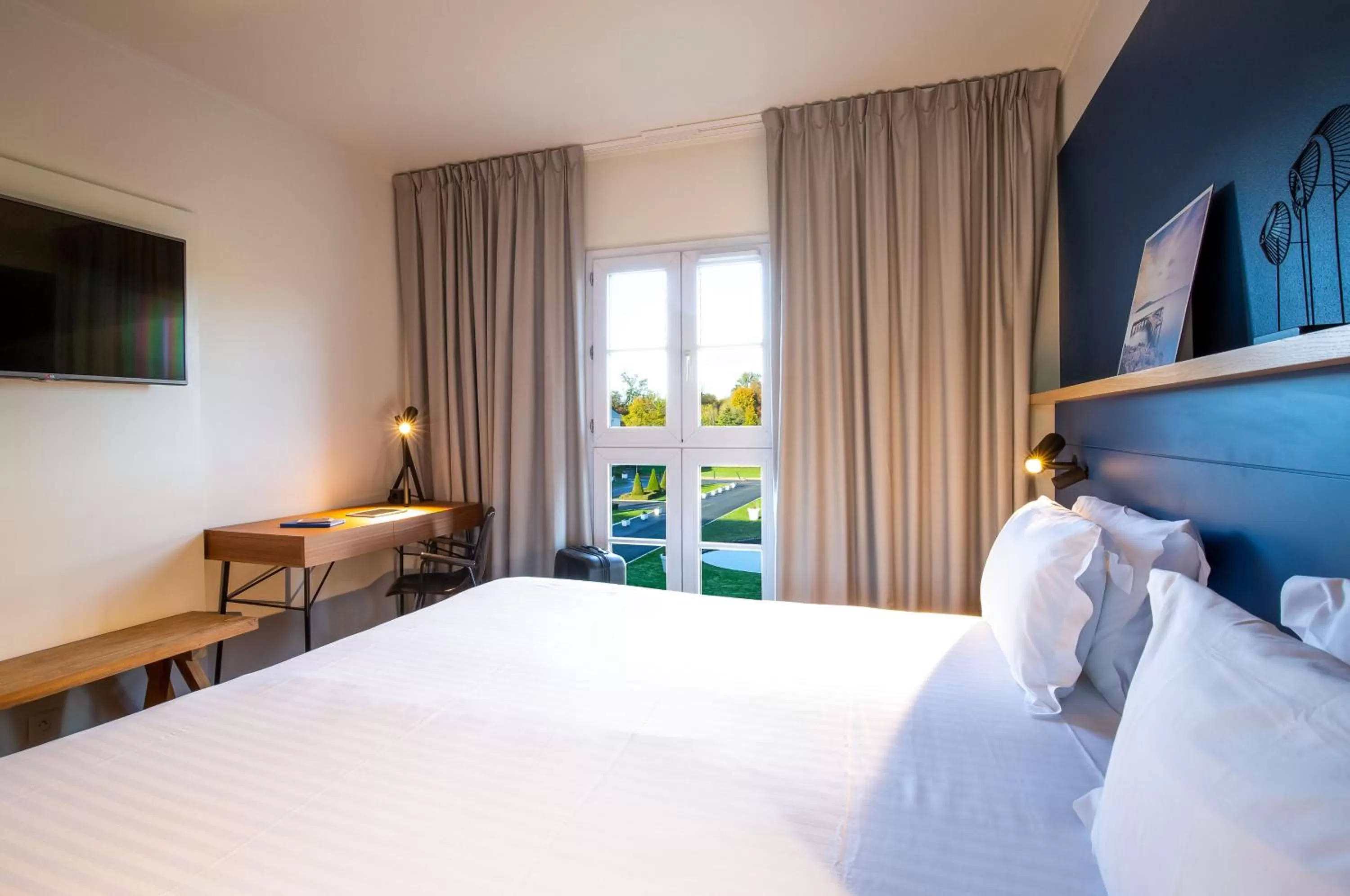 Photo of the whole room, Bed in Mercure Chantilly Resort & Conventions