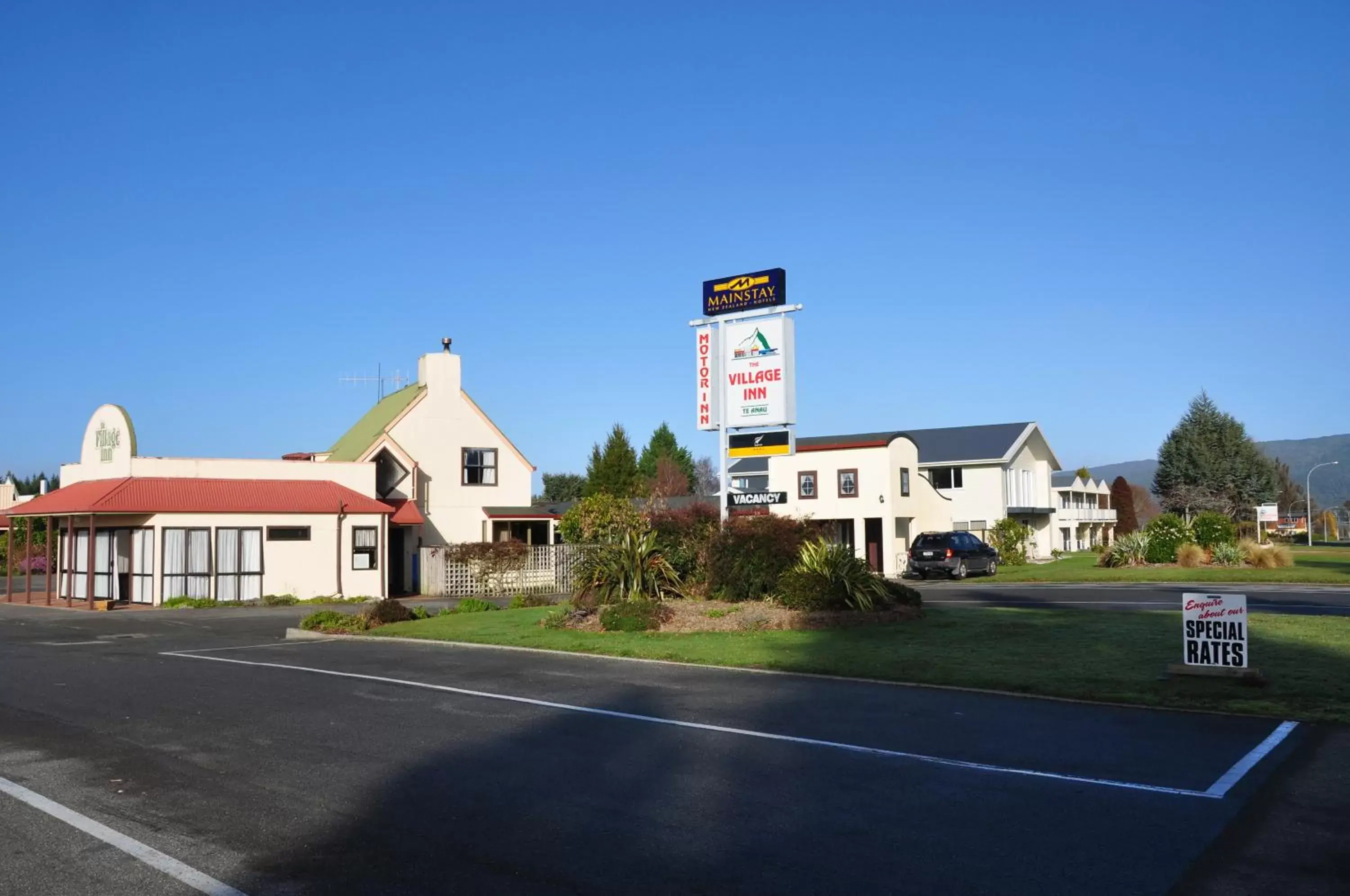 Property logo or sign, Property Building in The Village Inn Hotel