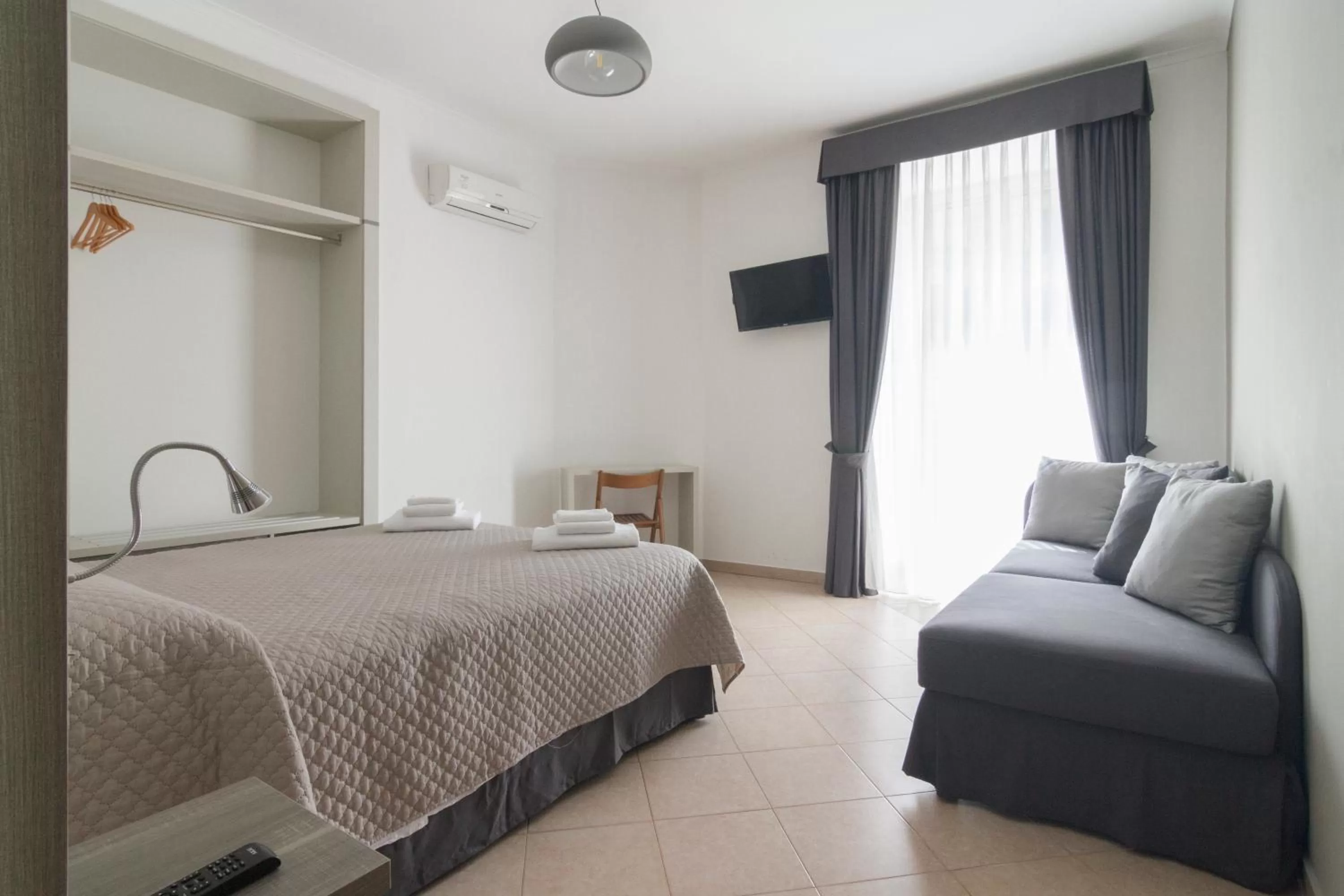 Bed in San Marco Hotel