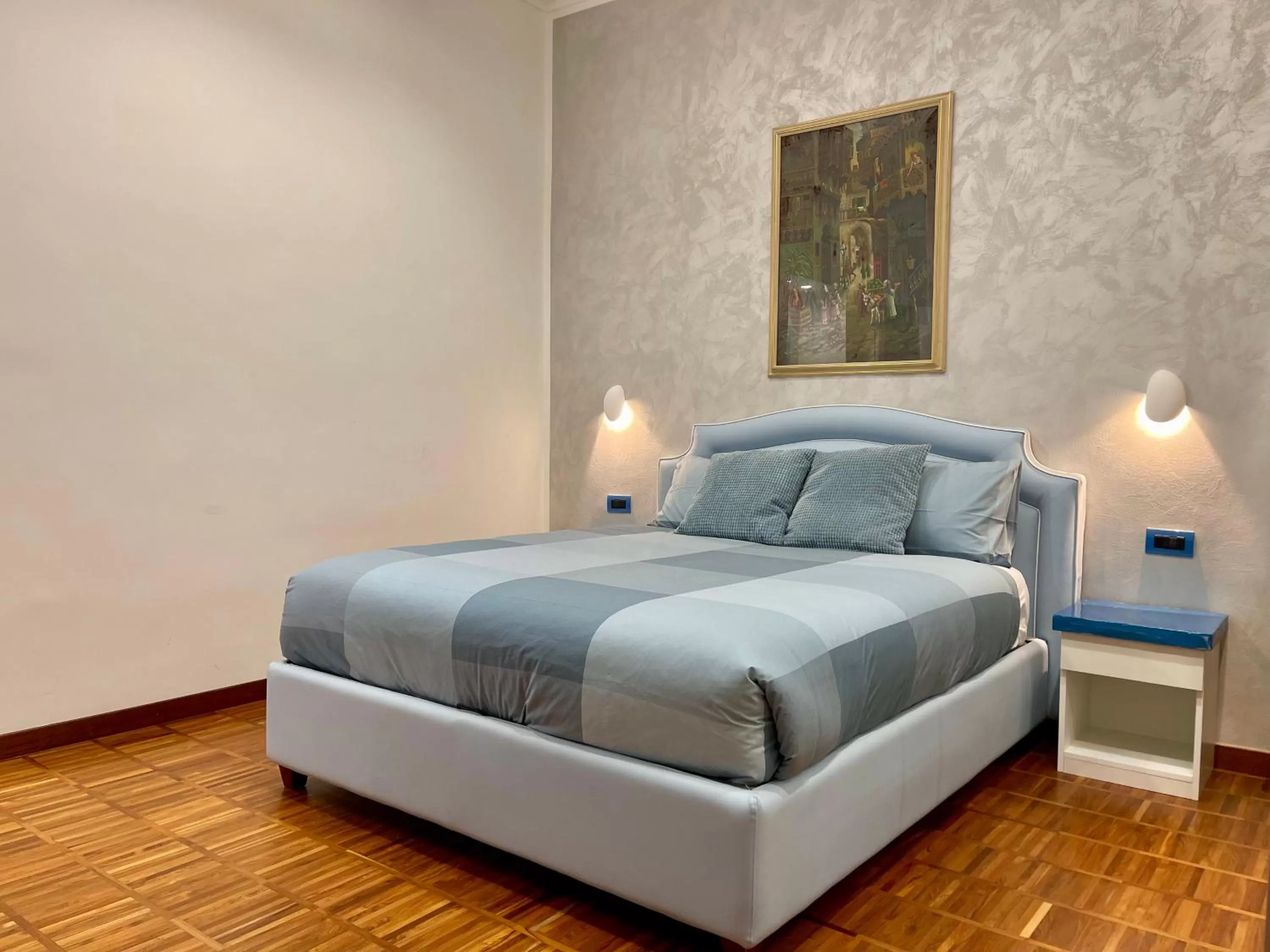 Bed in Tribus Boutique Hotel