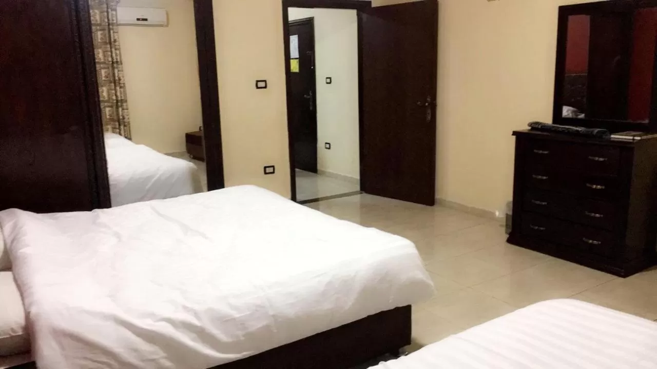 Bed in Al Tawheed Hotel Apartments