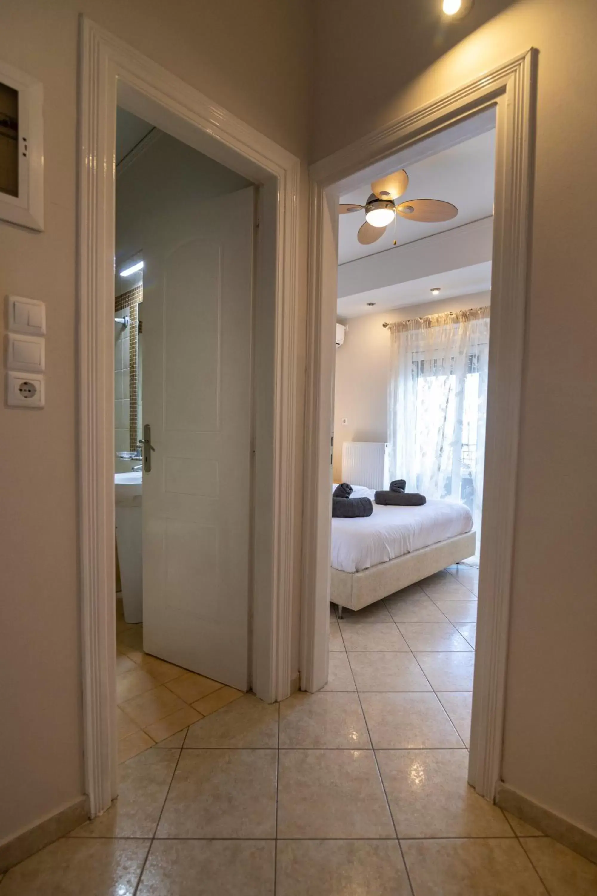 Bed, Bathroom in Votsalakia Hotel & Suites