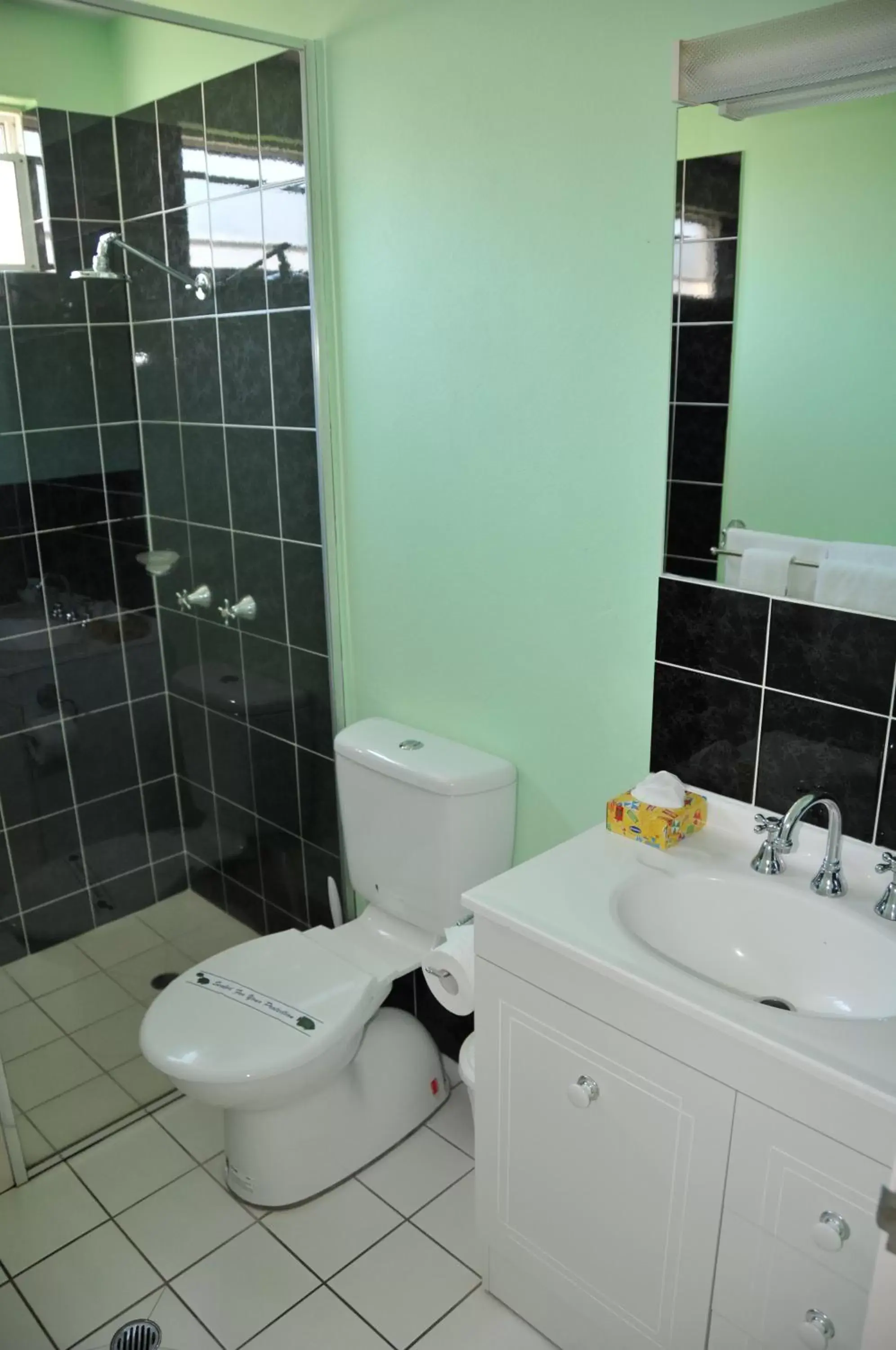 Toilet, Bathroom in Reef Gateway Apartments