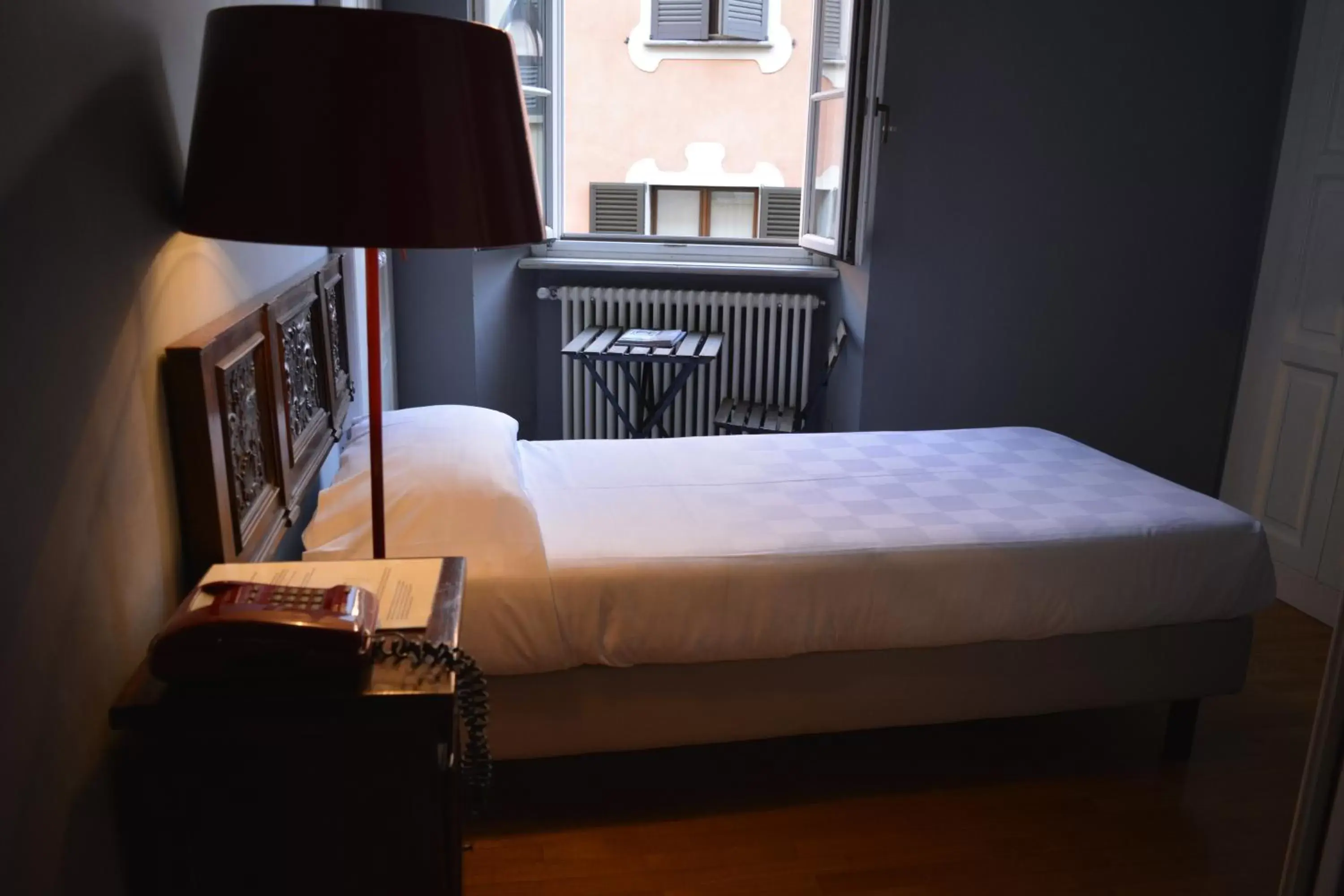 Photo of the whole room, Bed in Albergo Bologna