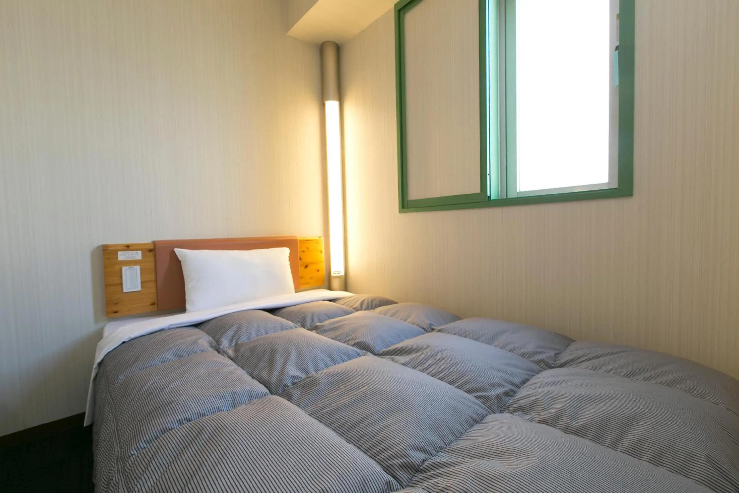 Photo of the whole room, Bed in R&b Hotel Nagoya-Nishiki
