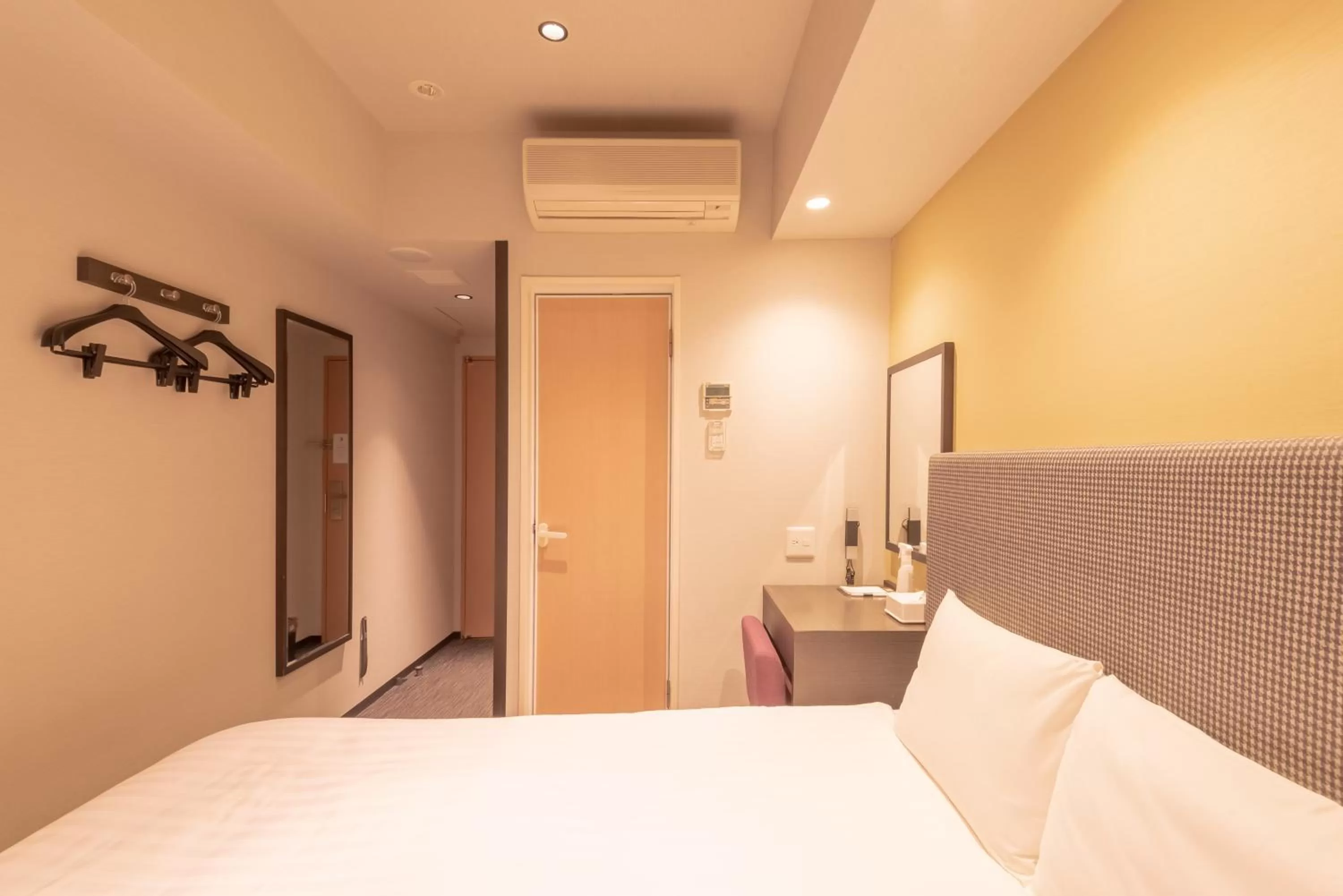 Bed in E Hotel Higashi Shinjuku