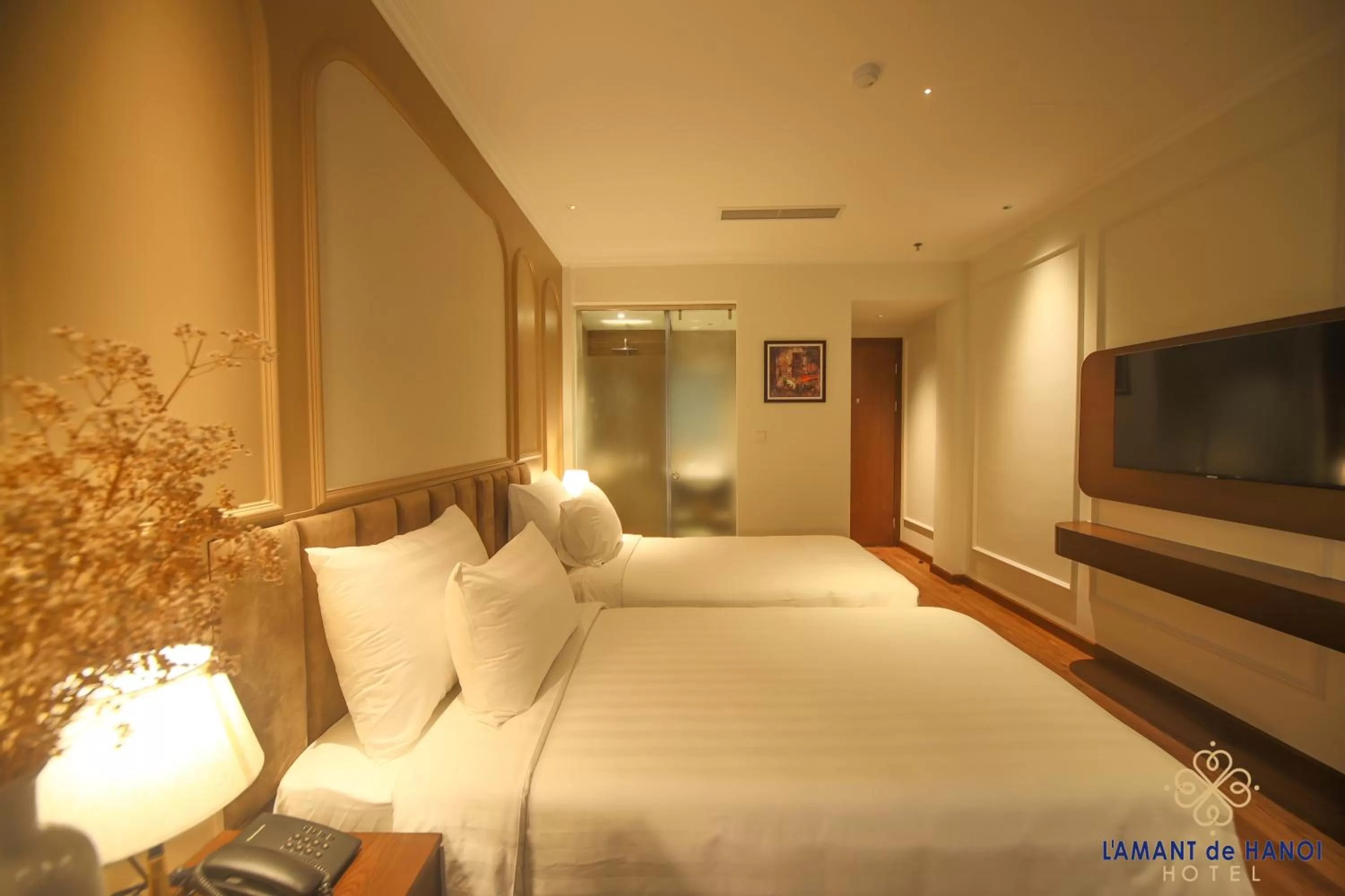 Bed in L'amant de Hanoi Hotel - khách sạn Lamant de Hà Nội