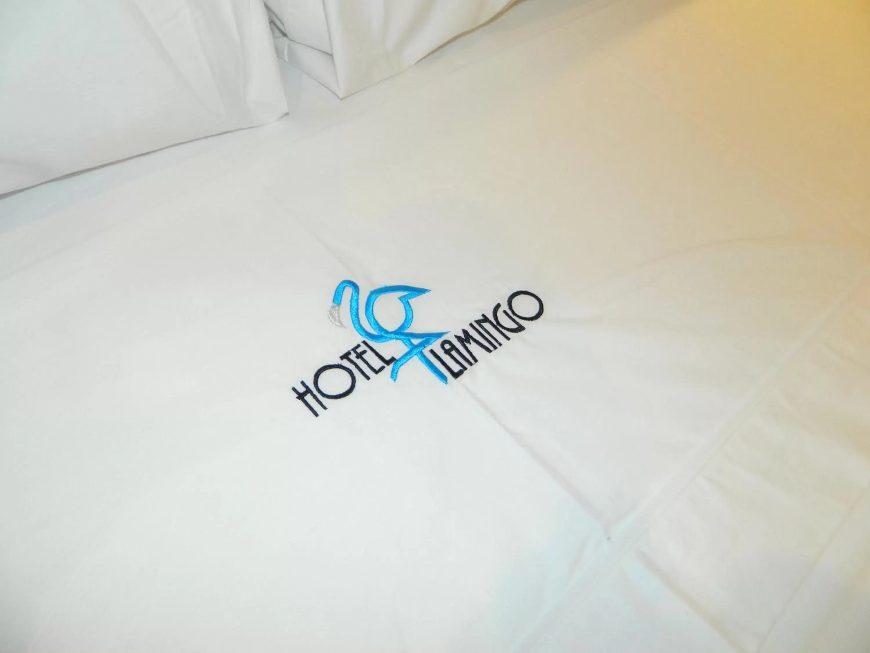 Bed, Logo/Certificate/Sign/Award in Hotel Flamingo Merida