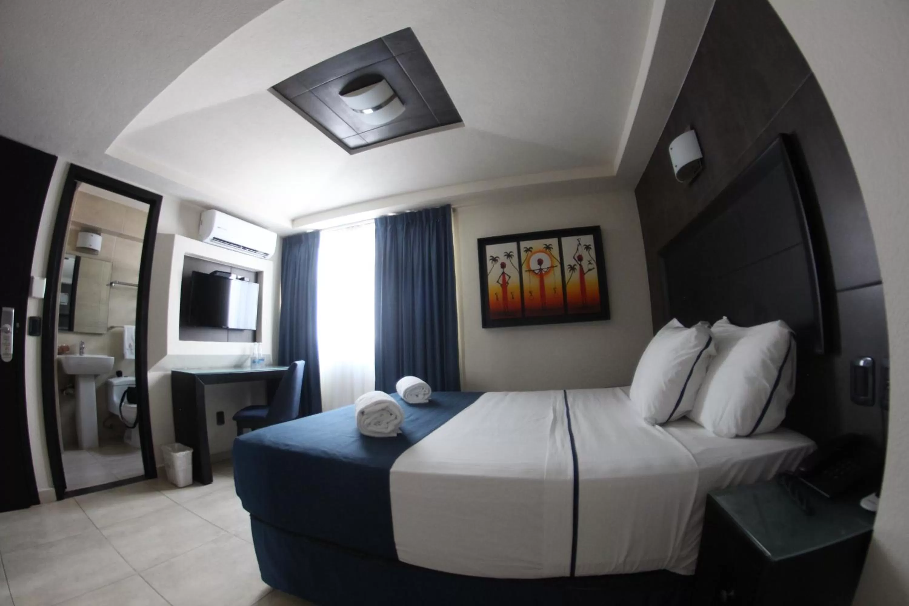 Photo of the whole room, Bed in Hotel Portonovo Plaza Malecon