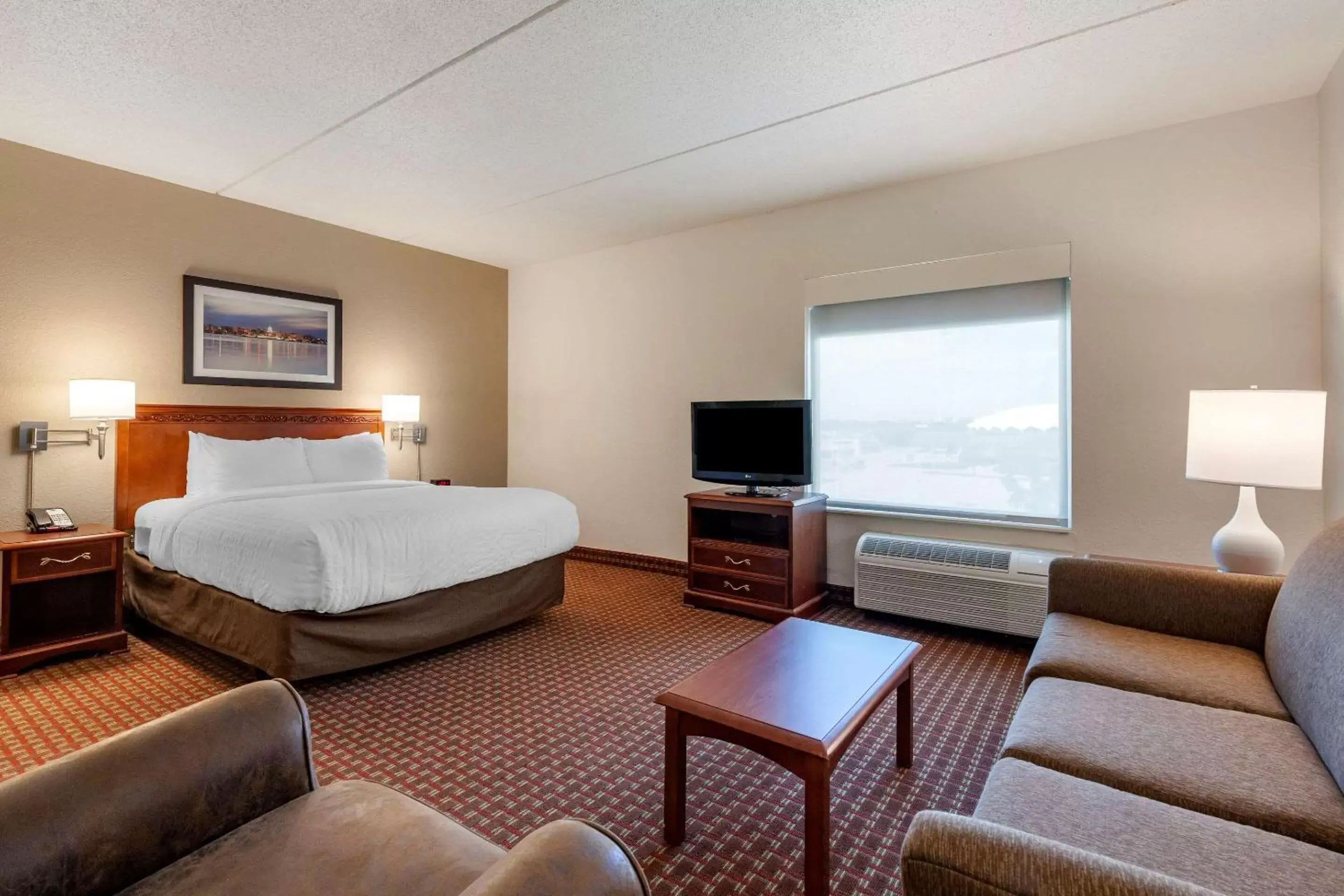 Bedroom in Clarion Suites at The Alliant Energy Center