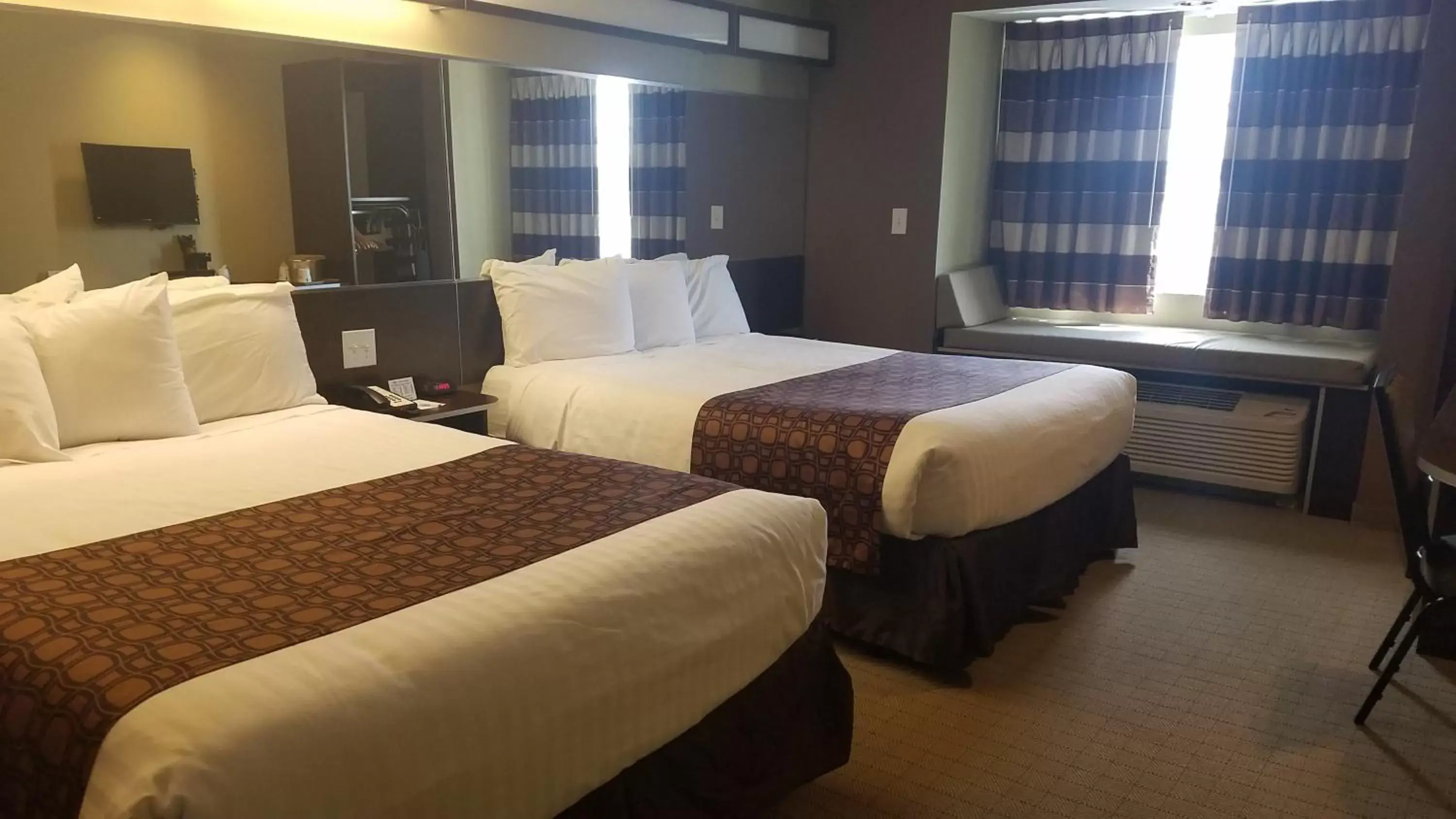 Bed in Microtel Inn & Suites by Wyndham