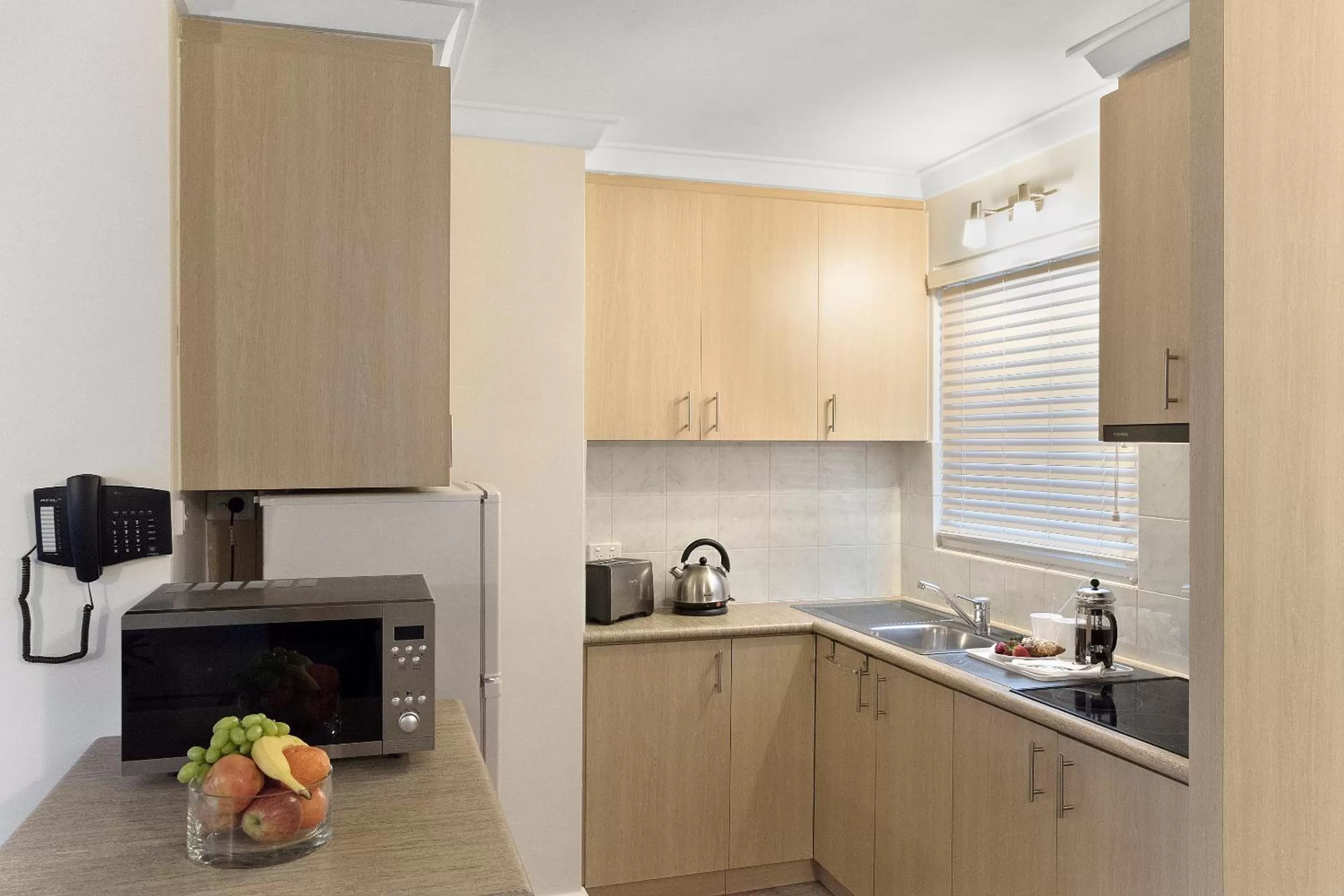 Kitchen or kitchenette in The Peninsula Riverside Serviced Apartments