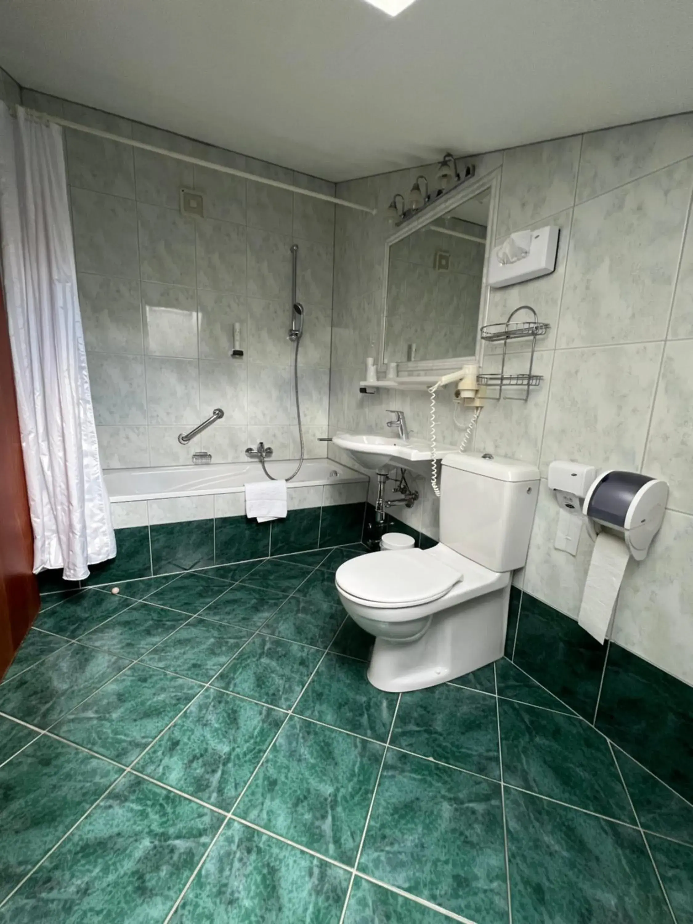Bathroom in Ramada Residences by Wyndham Saalfelden