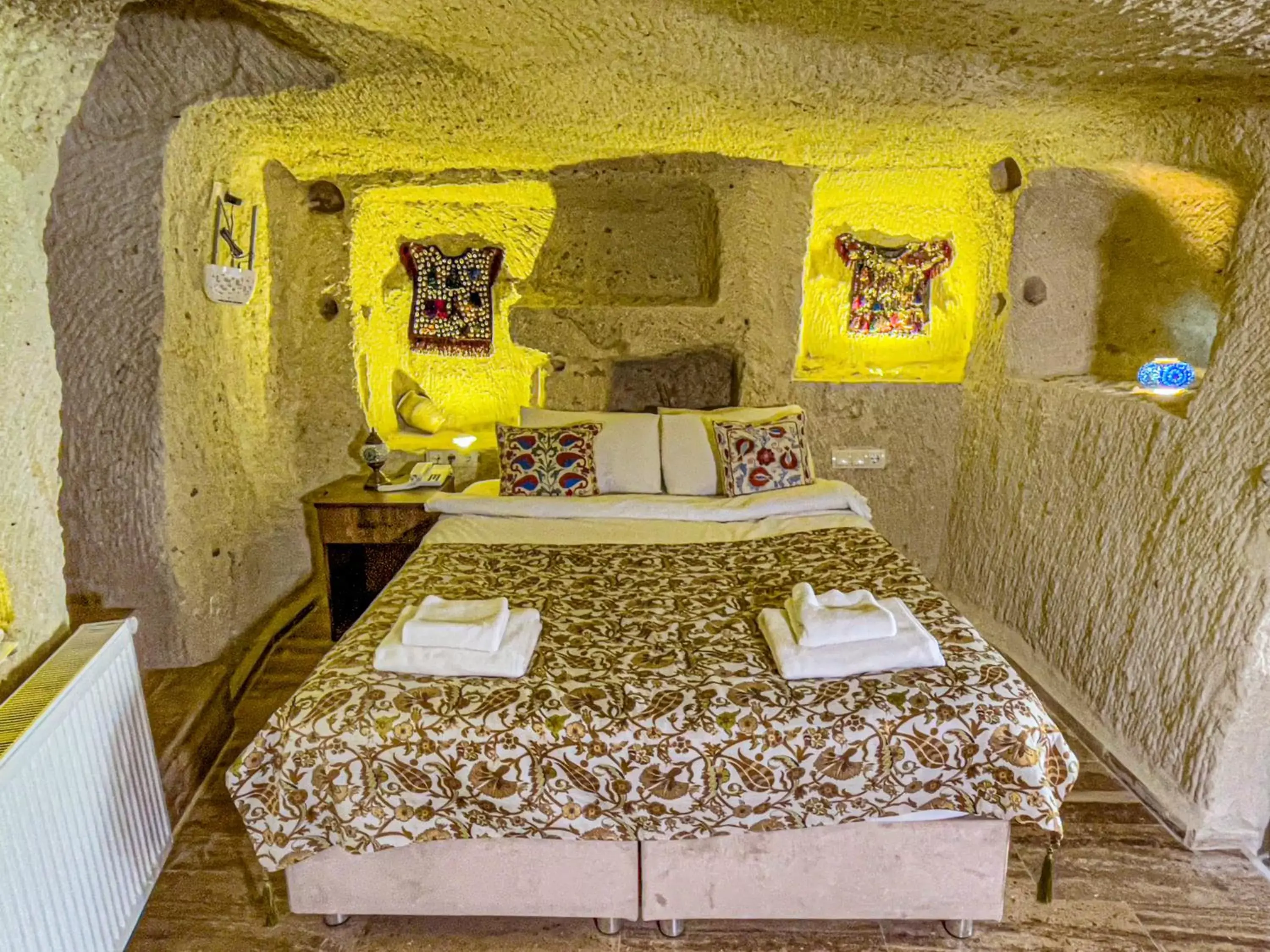 Bed in Heritage Cave Suites