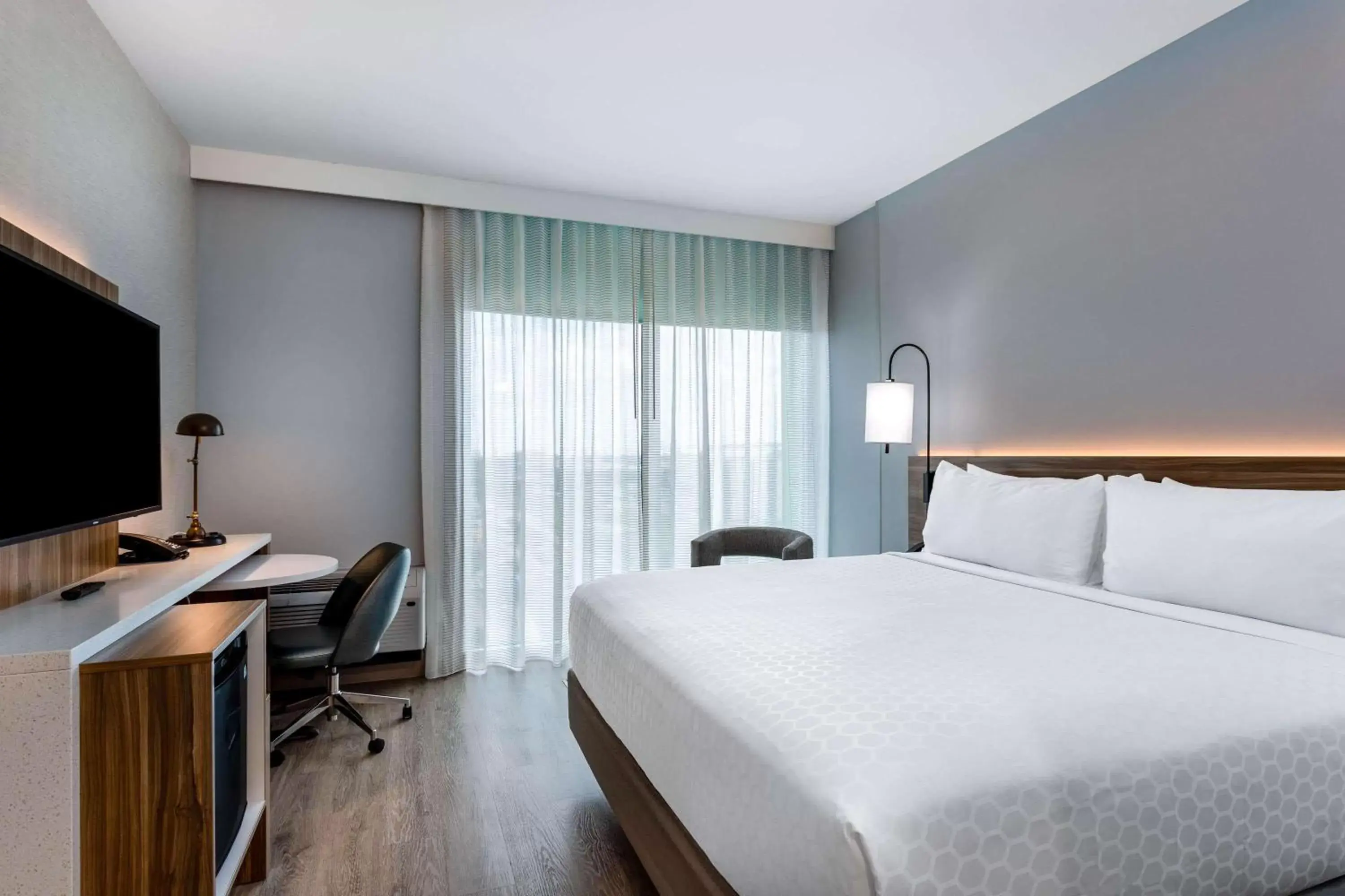Photo of the whole room, Bed in Wyndham Garden Miami International Airport