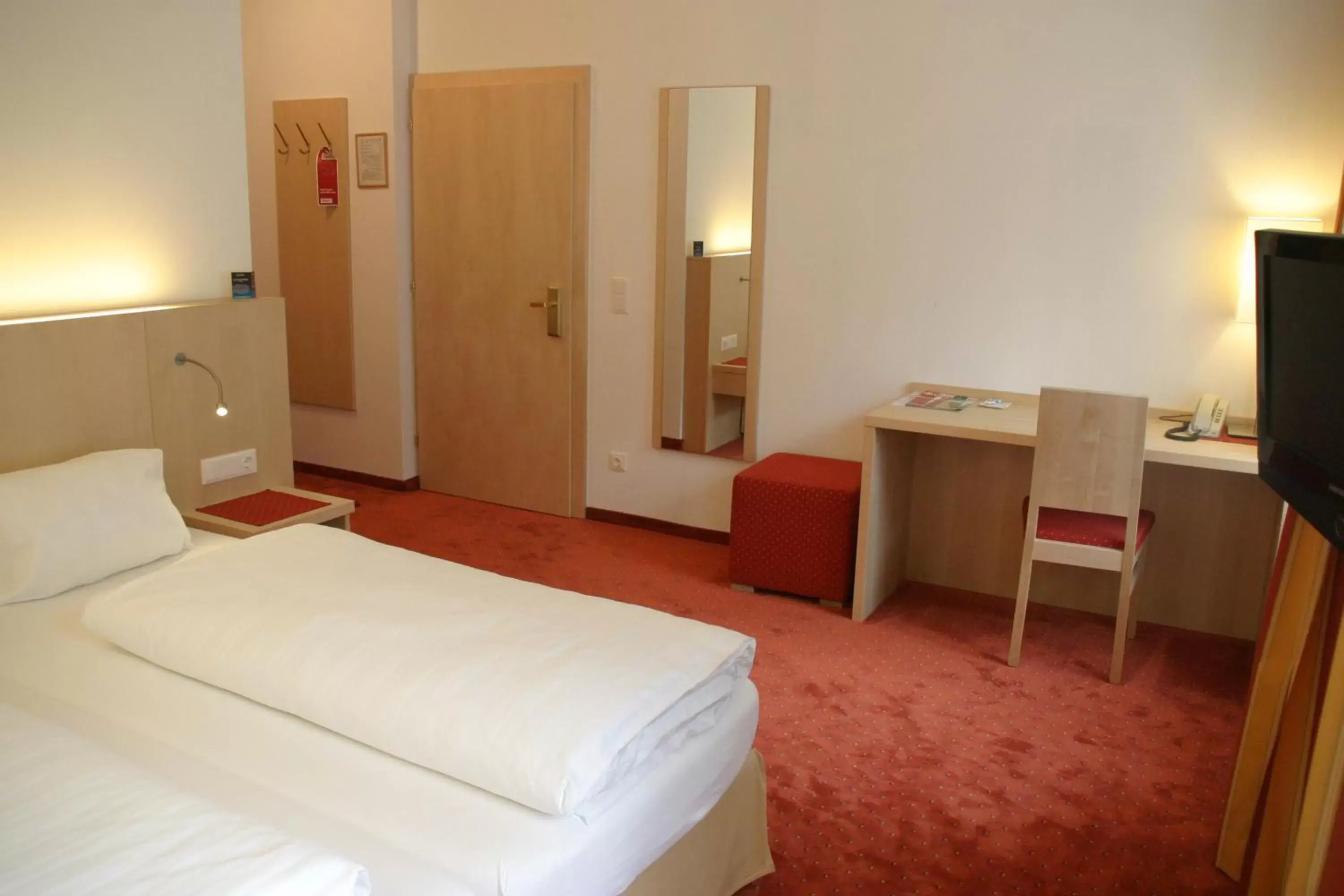 Photo of the whole room, Bed in Austria Classic Hotel Heiligkreuz Photo of the whole room, Bed in Austria Classic Hotel Heiligkreuz