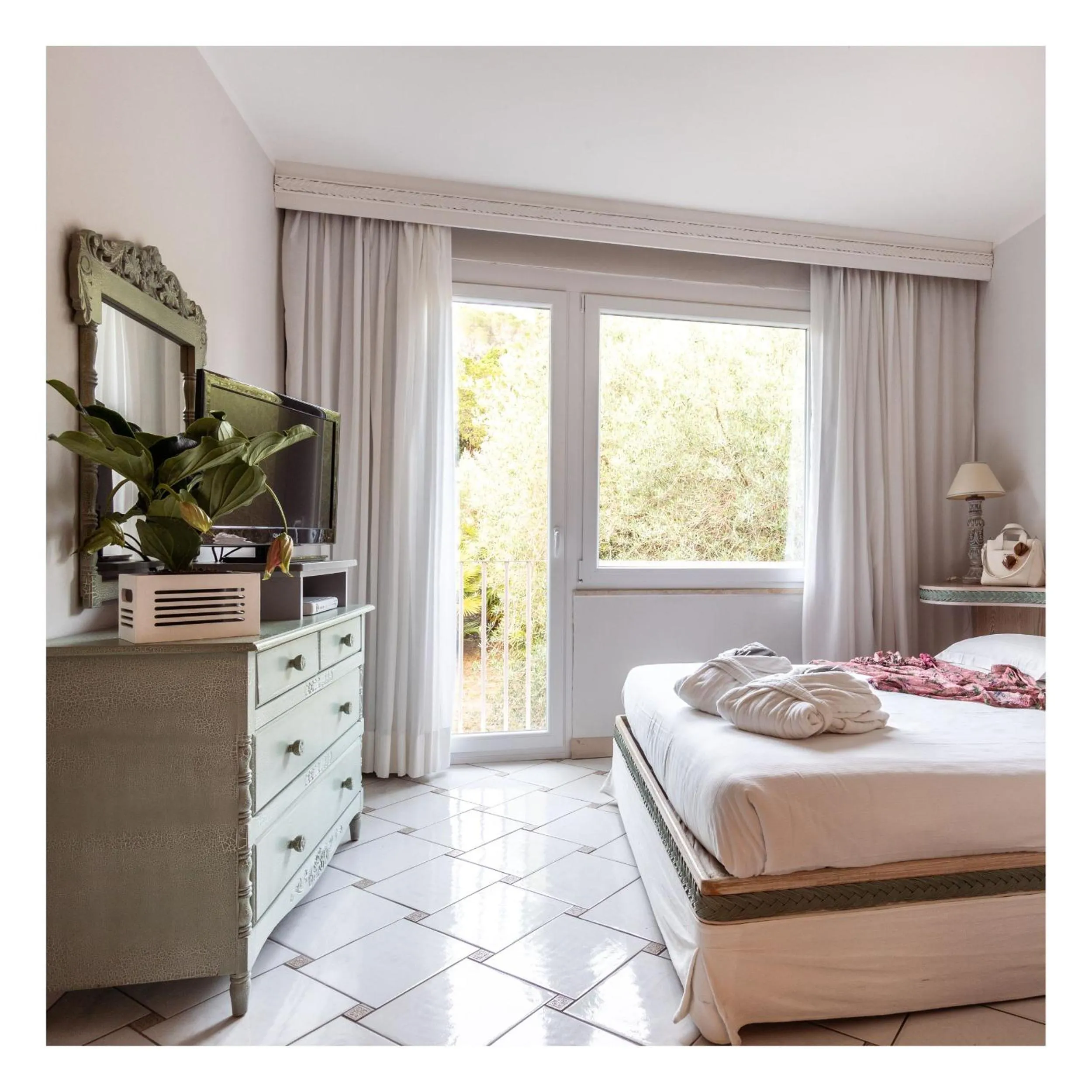 Bed in Golf Hotel Punta Ala