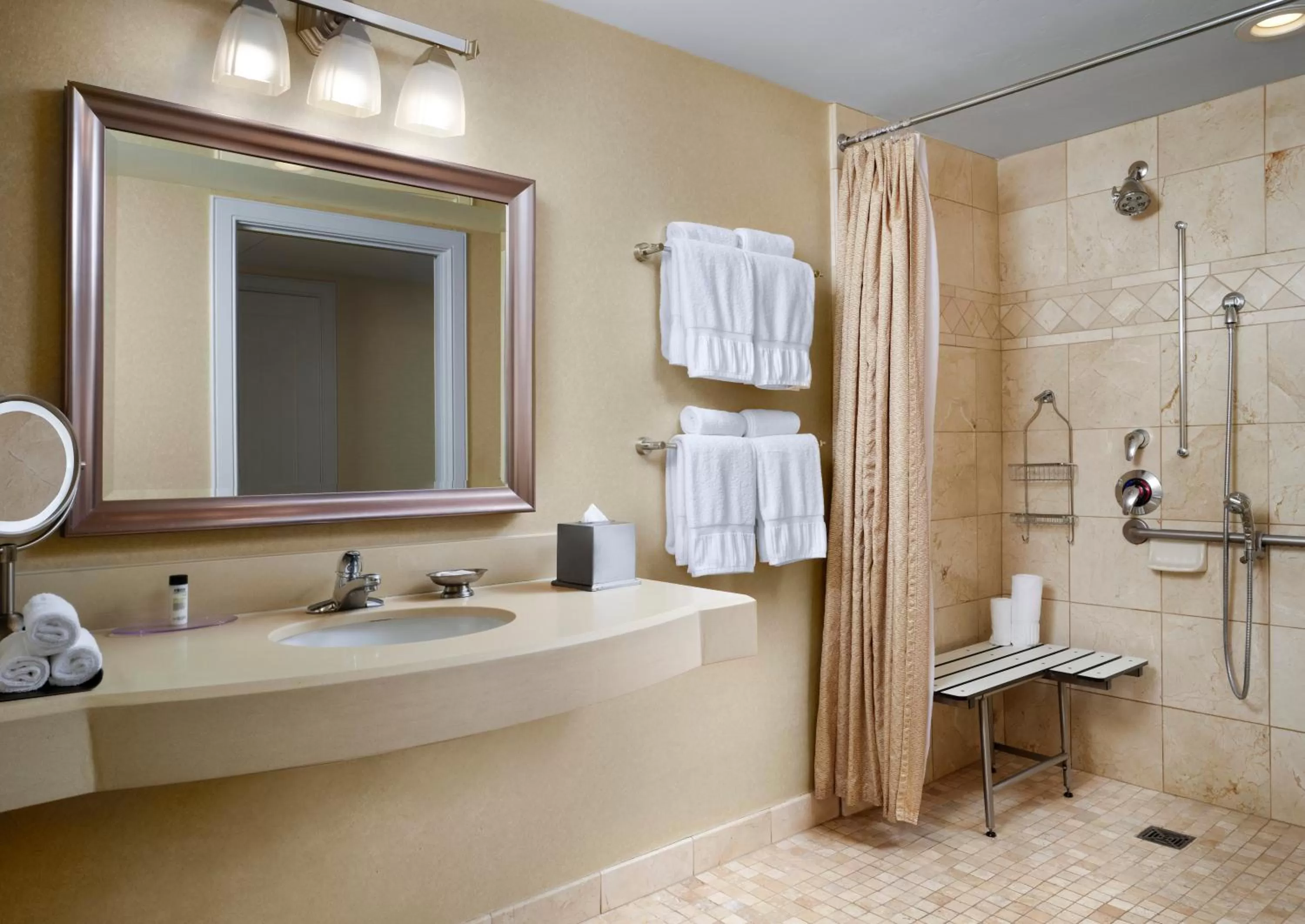 Bathroom in West Inn & Suites