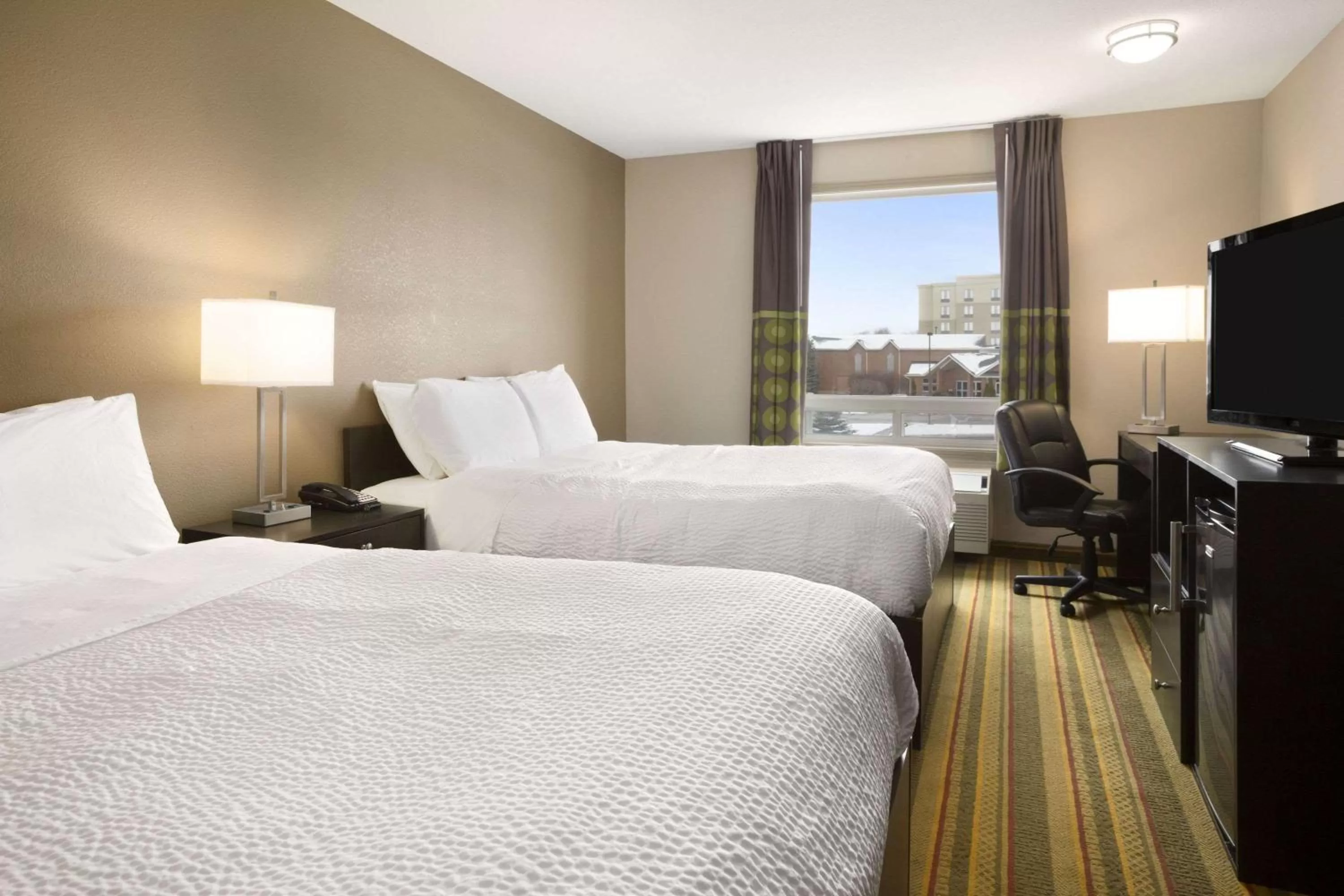 Photo of the whole room, Bed in Days Inn by Wyndham Woodstock