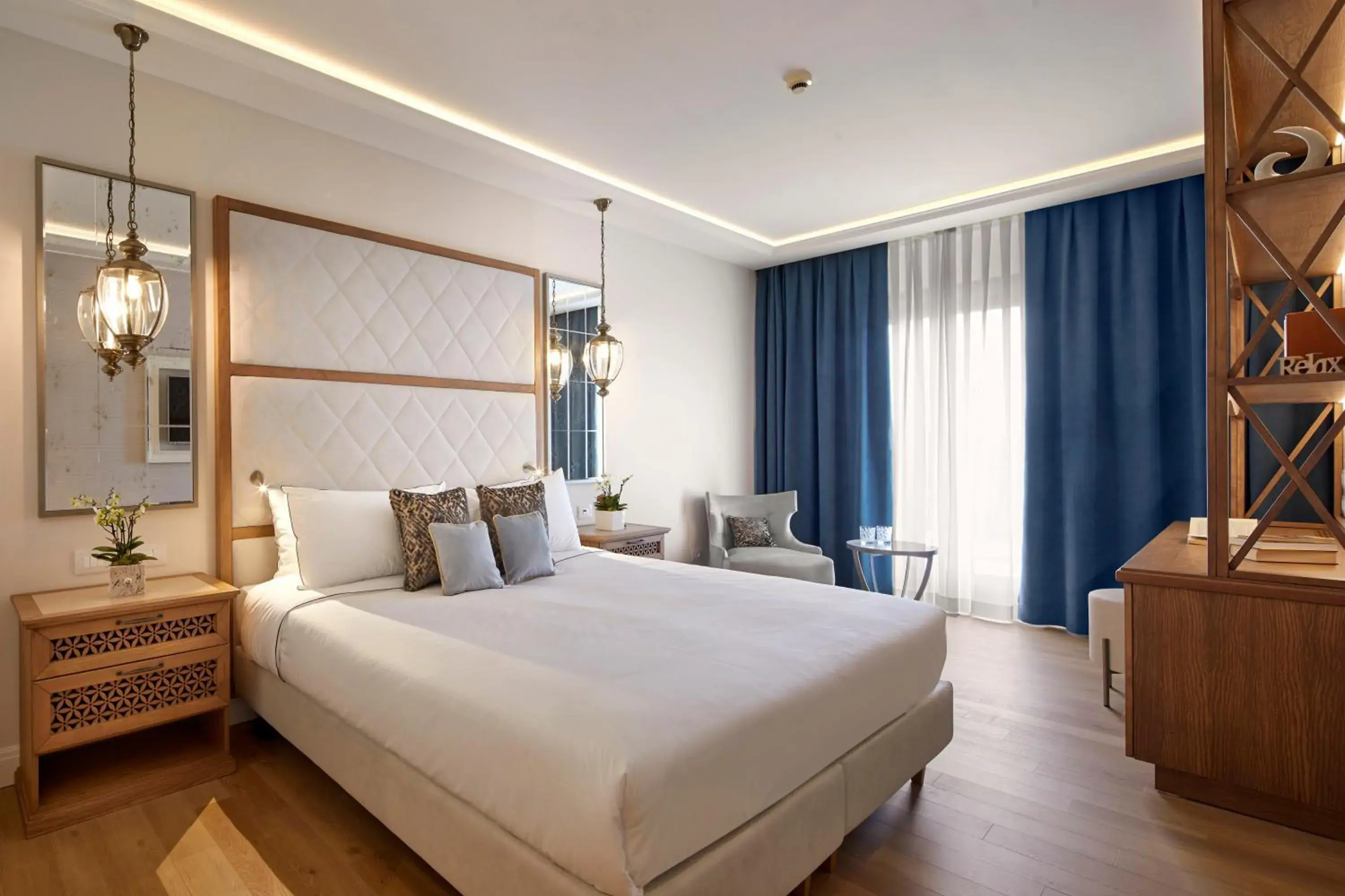 Bed in Madrigale Panoramic&Lifestyle Hotel