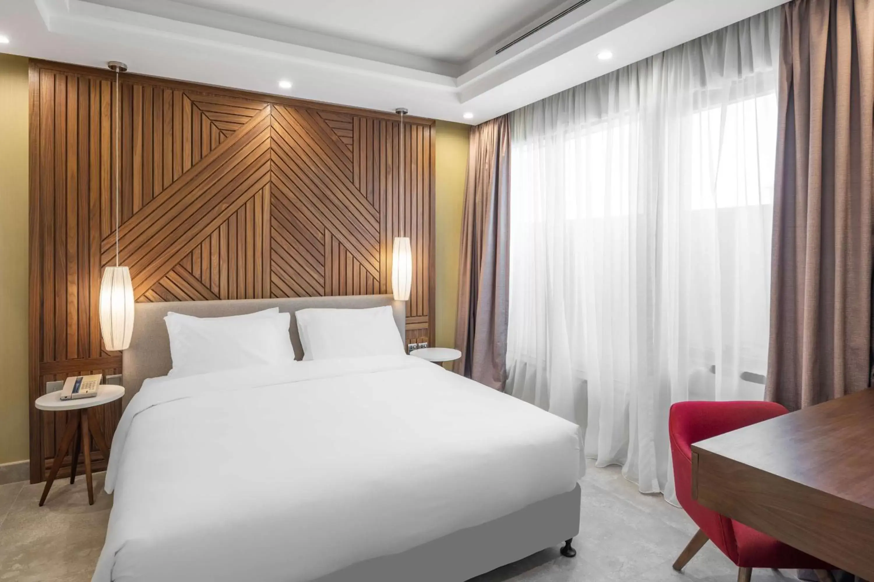 Bed in Radisson Blu Hotel Riyadh Qurtuba